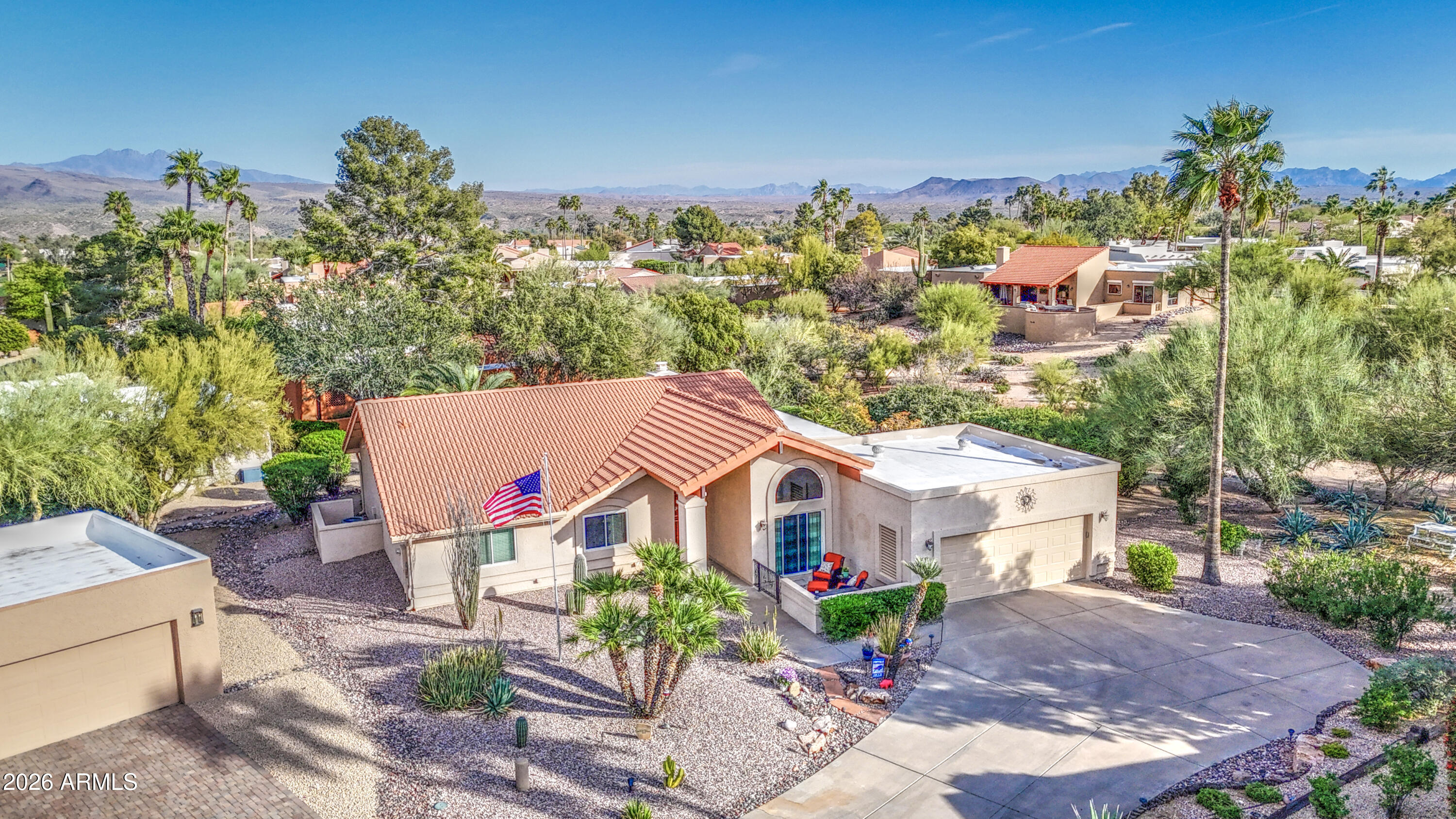 Some lots in Rio Verde are just lots. This one is a private sanctuary.

Tucked at the end of a quiet cul-de-sac -- no through traffic, just neighbors who chose to be here -- this beautifully maintained 3 bed/2 bath home sits on an oversized 0.37-acre lot with something rare in this community: a massive wraparound covered patio that transforms outdoor living into the centerpiece of your day. Morning coffee, afternoon shade, evening entertaining -- all wrapped in privacy and mature desert landscaping. 

Inside: vaulted ceilings, a cozy fireplace, granite kitchen, LVP flooring, skylight & 2-car garage with cabinets. All appliances included. Move-in ready. All within Rio Verde -- a beloved 55+ community NE of Scottsdale with two golf courses, golf-cart streets, pool, pickleball & more. This is the home for the buyer who knows what they want -- outdoor space, genuine privacy, and a layout that works beautifully for this chapter of life.

The single-level design includes zero-grade entry, wide hallways, and finishes chosen for ease and comfort -- the kind of thoughtful details that matter now and will matter even more later. The spacious primary suite offers dual sinks, a soaking tub, separate shower, and walk-in closet.

The kitchen features granite countertops, stainless steel appliances, and a bright breakfast nook with direct patio access -- so your morning starts outside if you want it to. Updated luxury vinyl plank flooring flows through the main living areas. Newer water heater and updated irrigation system mean the big maintenance items are already handled. Security system owned.

And then there's the patio. The wraparound covered outdoor space is genuinely rare in Rio Verde -- most homes simply don't have a lot this size or this private. Whether it's morning coffee, afternoon shade, or an evening with friends, this is where life happens on El Cortez Place.

Rio Verde Community Highlights:
-- Two 18-hole golf courses (optional membership)
-- Golf-cart-friendly neighborhood streets
-- Clubhouse, restaurant, pool & heated spa
-- Fitness center, library, craft & art studio
-- Tennis & pickleball courts
-- Biking & walking paths
-- HOA covers cable TV, grounds, street maintenance & trash
-- Active social calendar with clubs and community events

This is the lifestyle. This is the lot. This is the one.