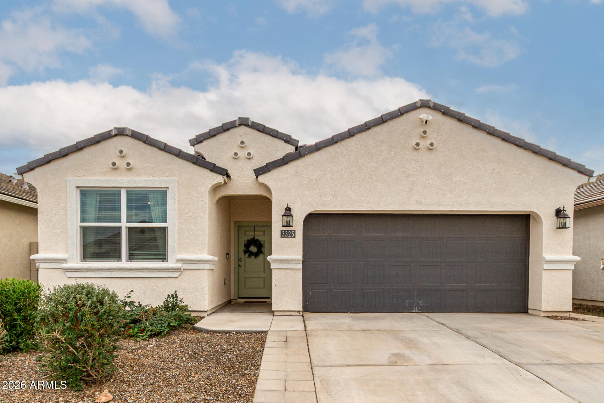 Step inside this barely lived-in, move-in ready home nestled in the highly sought-after Radiance community of Apache Junction. Featuring the popular Harris floor plan, this thoughtfully designed home offers 4 bedrooms, 2.5 bathrooms, and 1,847 square feet with a desirable split floor plan. Upon entry, you're greeted by a bright and welcoming foyer that leads to 3 bedrooms located near the front of the home. A full bathroom with modern fixtures and a shower/tub combination conveniently serves these bedrooms. As well as a half bathroom is located near the main living area, ideal for guests. The heart of the home opens into a spacious open-concept living area, perfect for both everyday living and entertaining. Large windows allow abundant natural light throughout. The completely remodeled kitchen is a standout feature, showcasing upgraded appliances, white cabinetry, granite countertops, and a large center island that seamlessly connects to the dining and living spaces.
The private primary suite is situated toward the back of the home and offers a relaxing retreat with a spacious walk-in closet and an en-suite bathroom featuring dual sinks, a large walk-in shower, and elegant finishes. 
Step outside to enjoy Arizona living with a low-maintenance backyard featuring turf and an above-ground pool, creating a private outdoor space perfect for relaxing or entertaining.
Located in the vibrant Radiance development, residents enjoy access to a community pool, splashpad, fitness center and a club house making this neighborhood perfect for families and those who love to entertain. Don't miss your chance to own this turnkey, upgraded home in one of Apache Junction's newest and most desirable communities. Come check out this amazing home today!
