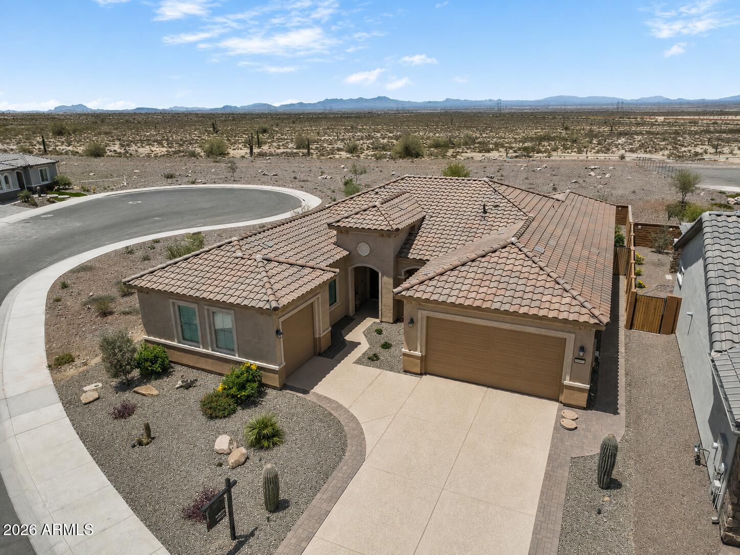 PRICE REDUCTION on this 2025 CUL-DE-SAC Home * TOP-Upgrades * DESERT Back PREMIUM Lot * FULLY Landscaped & Pavered Front and Back Yards * MOUNTAIN Views * NO DIRECT Neighbors * 3 bed/ 2.5 Bath * PLUS DEN with DOUBLE Glass FRENCH DOORS * 3 -CAR EPOXIED Garage * STACKABLE WALL-TO-WALL Sliding Door * LUX Kitchen featuring:  TOFFEE Granite Countertops, OVERSIZED Island with Breakfast Bar, GAS Cooktop, DOUBLE Wall Ovens & WALK-in Pantry * FULL-SIZED Laundry Room * ELECTRIC Blinds & LOUVERED Shutters * LARGE Primary Suite includes: BACKYARD Access, WALK-in closet, SPACIOUS Ensuite with DUAL Vanities & MODERN Tiled LOW Threshhold Shower with DOUBLE Shower Heads * Select Brand-New Furnishings and Appliances may convey. * Buyer financing incentive available Fabulous Sun City Festival offers access to: Golf, Resort-Style Pools, Spa, Fitness Center, Pickleball, Tennis, Trails, Community Clubs, Dining & More, all with convenient access to Loop 303 & nearby Shopping and Recreation!