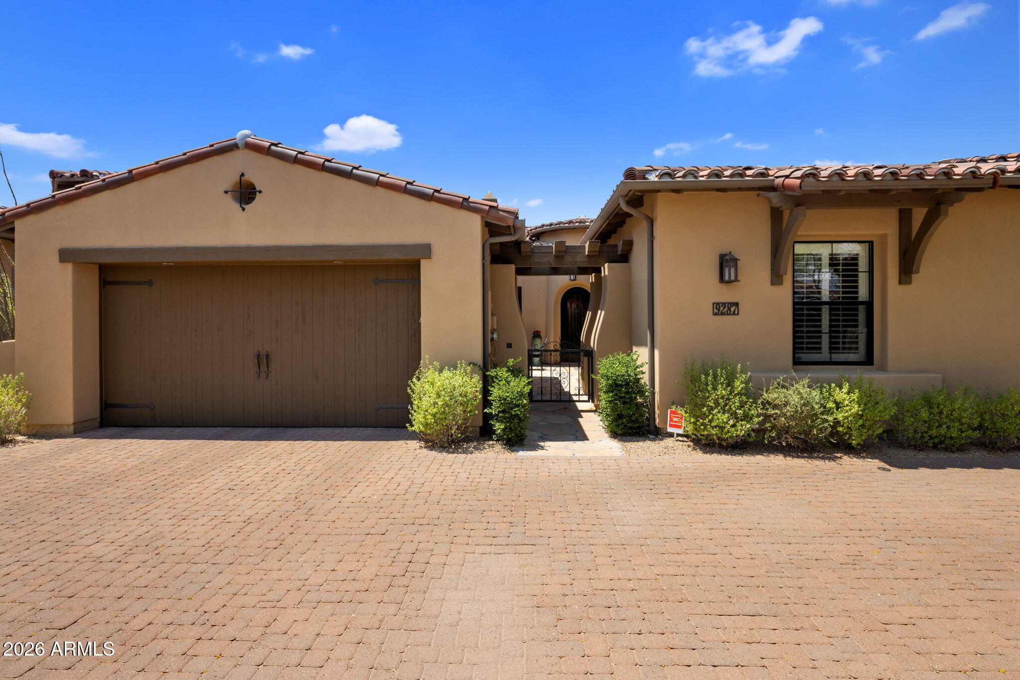 This former model is directly across from the resort-style community center with a pool and fitness facility, this remodeled home offers the lifestyle that makes gated DC Ranch one of North Scottsdale's most desirable communities.The home features 2 bedrooms and 2 baths, plus a private 1-bedroom, 1-bath casita, offering nearly 2,500 square feet of flexible living space for guests, extended family, or a home office. The 2019 renovation includes a custom kitchen with Knotty Alder cabinetry, Rocky Mountain Hardware, Sub-Zero and Wolf appliances, a Miele dishwasher, custom metal hood, and Franke sink. The luxurious primary bath features Diamond Thassos honed marble flooring, Onyx countertops, and matching custom cabinetry.Additional upgrades include a custom iron-and-glass front door, newer HVAC, whole-house water filtration, Phantom screens, and custom Alder office built-ins.
