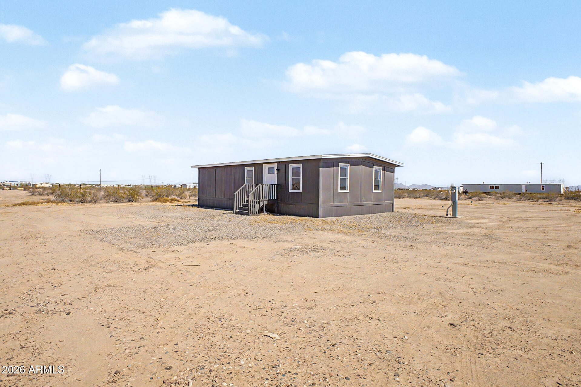 Welcome to this beautifully fully updated home situated on corner lot with 1.21 acres in the growing community of Tonopah, Arizona! This property features open floor plan. Step inside to discover upgraded flooring, fresh paint, updated fixtures, stainless steal appliancesand a stylish kitchen. Newer roof, plumbing and A/C bring peace of mind.
The spacious lot offers endless possibilities, bring your toys, RVs, animals, or build additional structures with plenty of room to grow. Enjoy peaceful Arizona sunsets, corner lot and the freedom of country living.  Property has NO HOA!! If financing is needed, There are several different options for this property.