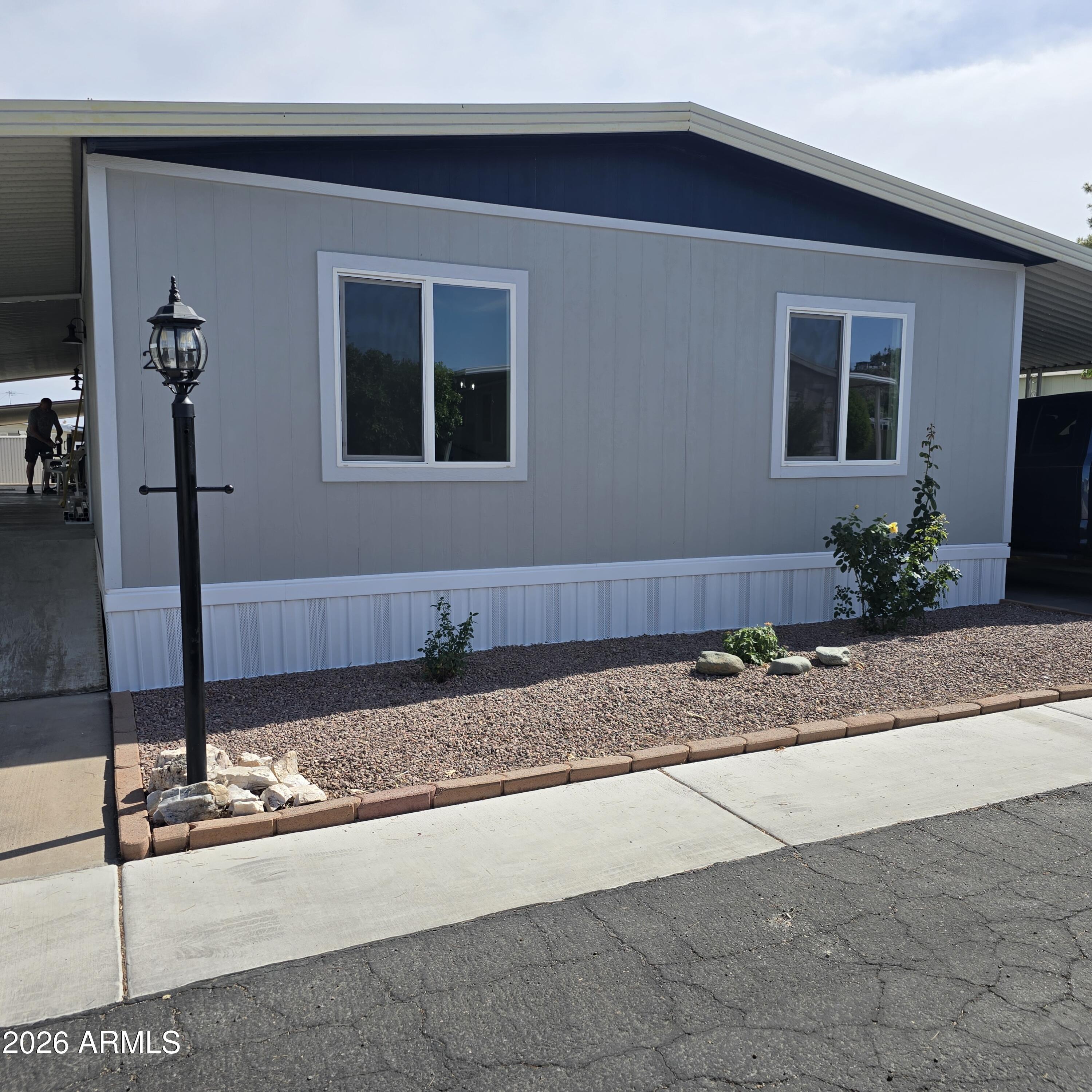 ON LEASED LAND:
This home is absolutely gorgeous!! It has been remodeled top to bottom. Ak drywall inside, 3 bedrooms, split floor plan, 2.5 bath!.  This is a must see.  Step inside to this home with vaulted ceilings.  Open front room to dining and kitchen. State of the art kitchen new cabinets, appliances and enjoy breakfast on the large breakfast bar. Primary is split floorplan, other 2 bedrooms on the other side of home.  Both bathrooms have custom showers, plenty of storage. Outside enjoy the screened front porch and a storage unit.  Large carport.

Paradise Shadows is a 55 plus age restricted resort community. Features include an indoor pool and spa to enjoy year round.  Lots of activities.