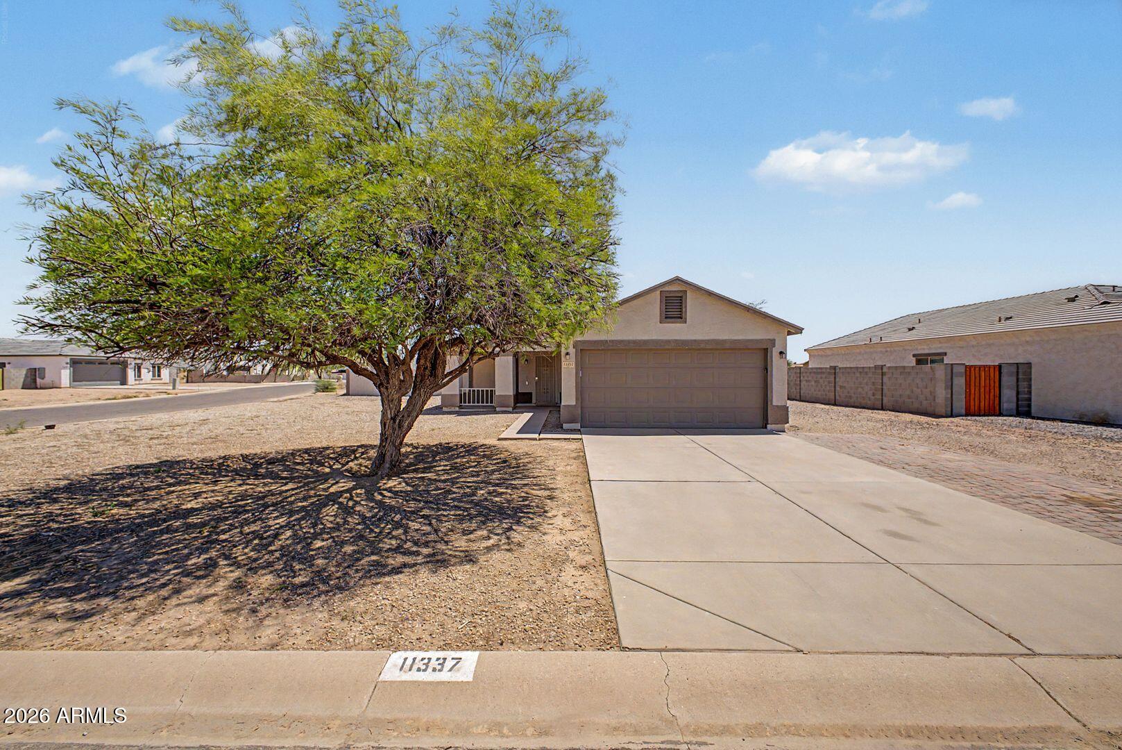 Discover this inviting ranch-style residence in Arizona City, featuring three bedrooms and two bathrooms designed for comfortable living. This property welcomes you with thoughtful updates and a layout that flows naturally from room to room.
Enter to find new wood plank laminate flooring throughout, creating a warm, unified aesthetic that ties the interior together. The kitchen is equipped with stainless steel appliances, ready to serve your cooking needs. Beyond the main living areas, a covered patio extends your living space outdoors, offering a sheltered retreat for relaxation or entertaining.
The three bedrooms provide distinct spaces for rest and privacy, while the two full bathrooms ensure convenience for the household. The ranch design keeps everything on one accessible level.