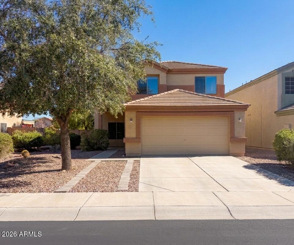 Seller offering concessions to well-qualified buyers, making this move-in-ready single-family home in The Village at SanTan Heights an exceptional opportunity and positioned for strong buyer demand in today's market. Fresh interior paint, brand-new carpet, and a bright open-concept layout create a modern, move-in-ready feel. The kitchen features stainless steel appliances, a large center island, and seamless flow into the great room perfect for entertaining. A rare main-level bedroom and full bath provide ideal flexibility for guests, a home office, or multigenerational living. Upstairs, the spacious primary suite includes a dual vanity, separate tub and shower, and a walk-in closet. Upgraded finishes throughout, an energy-efficient design, and a highly functional layout add to the appeal.