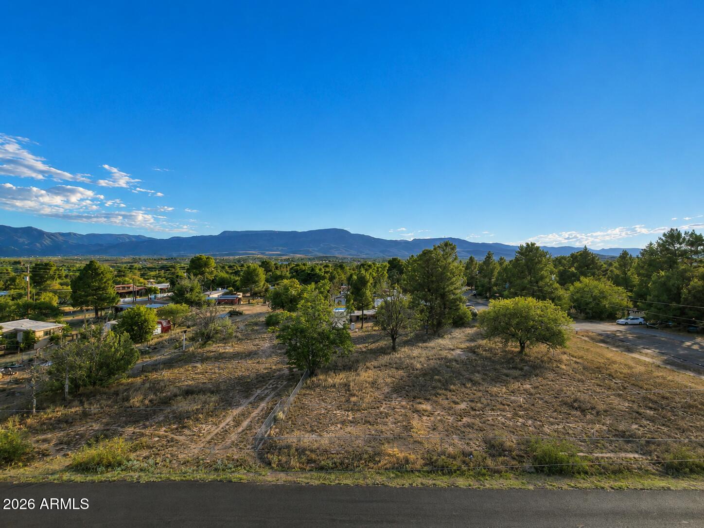 This mostly level vacant land offers a rare opportunity with an existing well already in place--adding convenience and value as you plan your next move. One of the few parcels in the area that allows for placement of a manufactured home, this property stands out as an attractive option for affordable housing, a primary residence, or an investment opportunity. With usable terrain and flexible potential, you can bring your vision to life while enjoying the charm, convenience, and growing appeal of Cottonwood living. Don't miss this chance to secure land with possibilities already built in.  Easy to envision and ready for your plans--bring your home and make it yours!