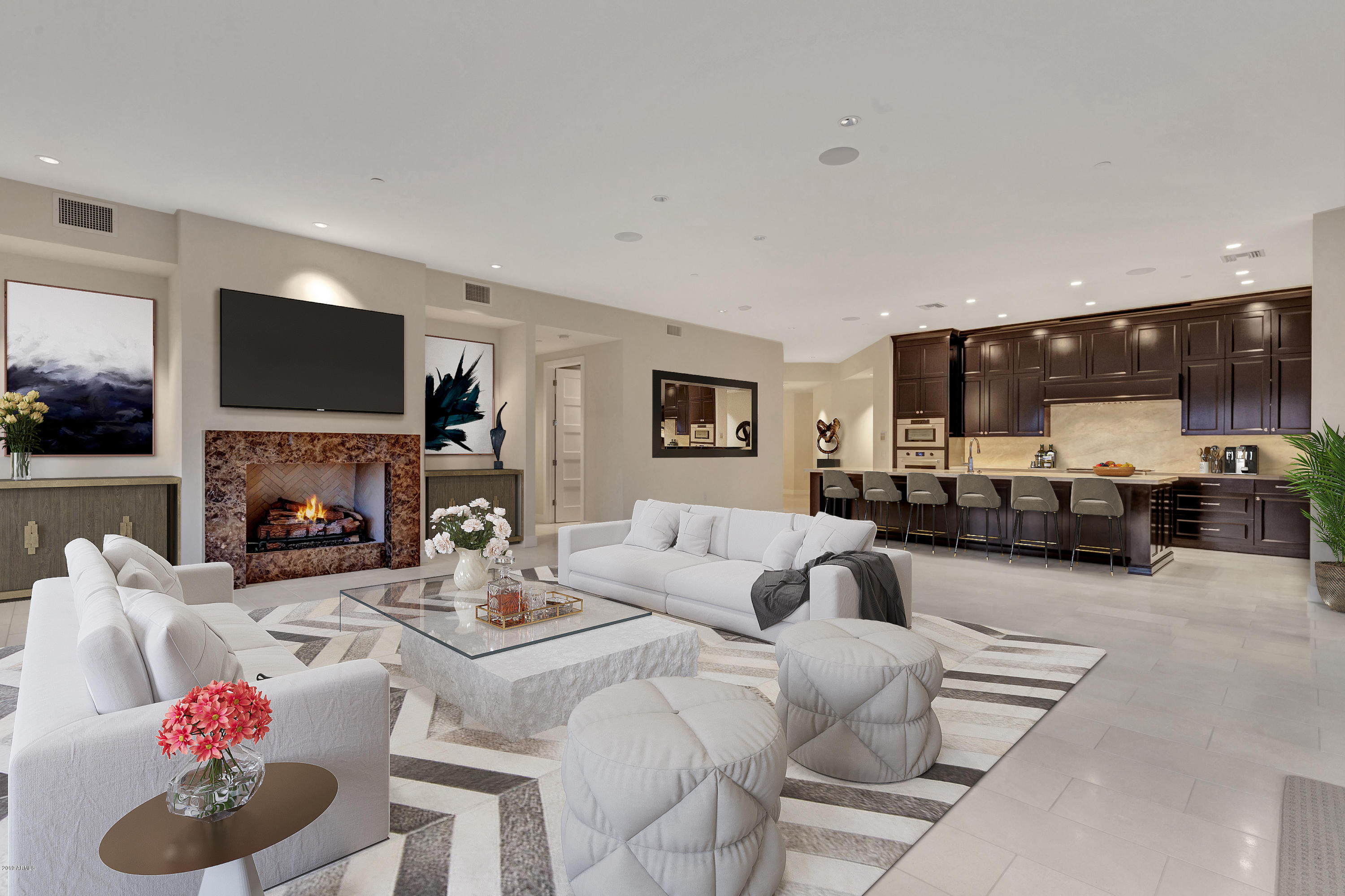 Located where Scottsdale meets Paradise Valley is The Enclave at Borgata. This new, never lived in Penthouse residence is ideally situated at a corner location within this thoughtfully designed community.  Special views of Camelback Mountain and light filled rooms surround you while the interiors of the residence are inclusive of the finest finishes. Portuguese limestone floors, Calcutta marble tops, Sherle Wagner hardware, and top tier appliances. Intricate millwork lines hallways and closet spaces, while Emperador marble surrounds several fireplaces. Amenities that rival world class resorts include, concierge services, gated entries, a refreshing pool, intimate gardens, a fitness center, and relaxing club room. This lock and leave home is inclusive of a four car garage and ample storage. This lock and leave home is inclusive of a four car garage, ample storage units and two designated parking spaces. Walking distance to several shopping and fine dining experiences this residence is perfect for the most discerning buyer.