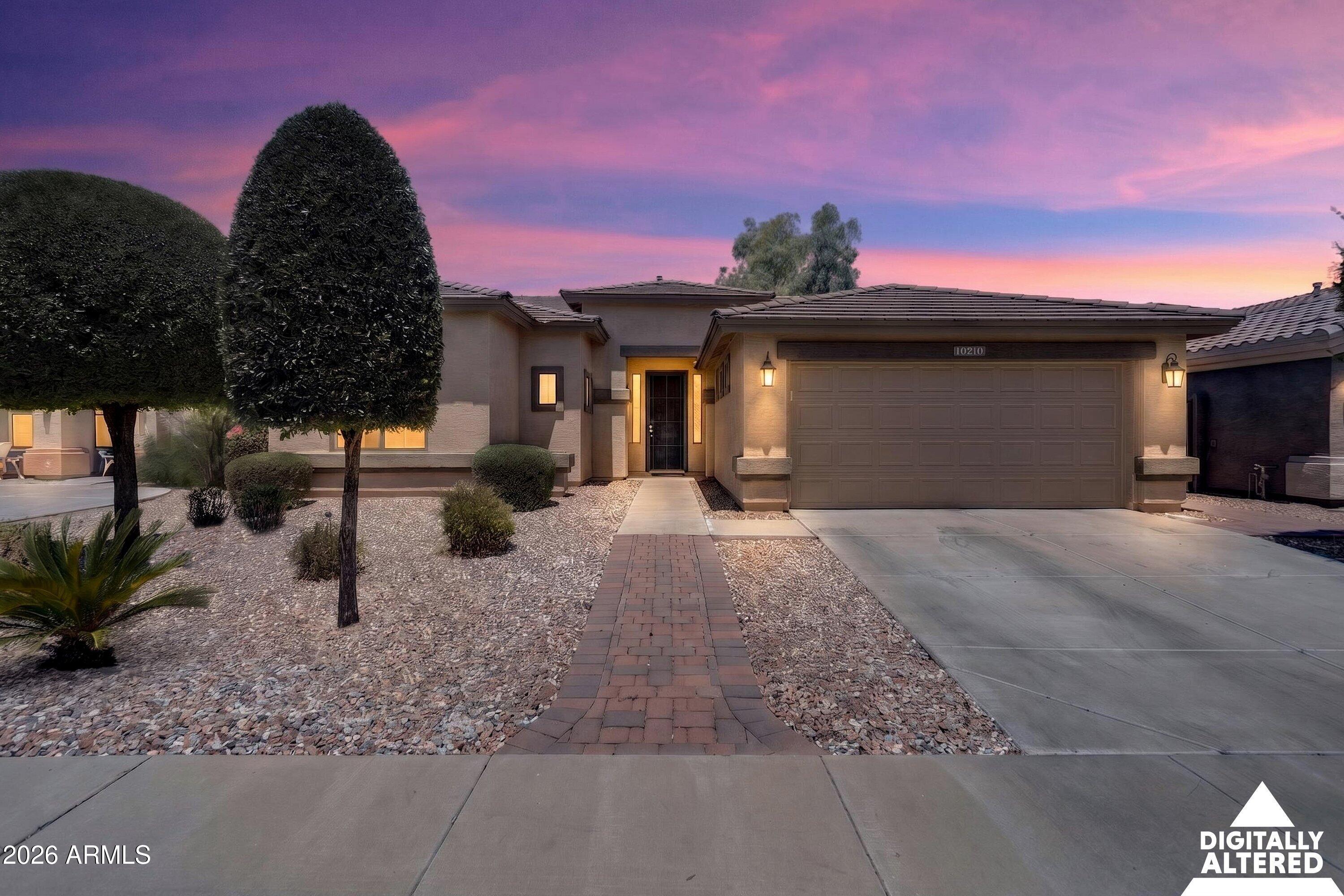Beautiful home located in the desirable Surprise Farms community! This property boasts a bright, open-concept layout with a split floor plan and an eat-in kitchen perfect for entertaining. The spacious master ensuite features a generous walk-in closet. Additional highlights include a paved walkway, fresh exterior paint, a dedicated laundry room with a built-in sink, a convenient tandem garage, new insulated garage door, newer water heater, and low-maintenance landscaping with a covered backyard patio. Move-in ready and full of charm, come see it today!