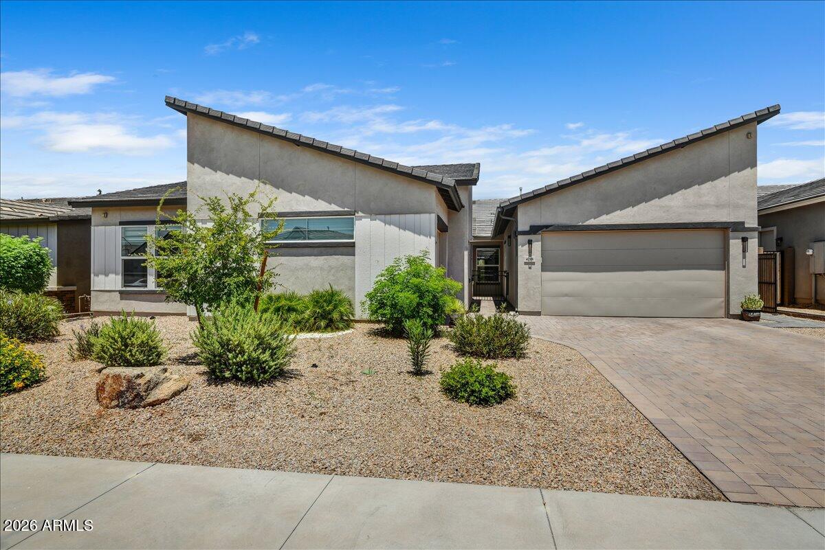 Better than New! Immacculate single level, Modern, Contemporary masterpiece in Cave Creek's coveted Saguaro Trails.  This 4 BR/3.5BA home boasts 8ft doors, Soaring Vaulted and Beamed Ceilings, Custom Lighting, a Linear Fireplace & Modern tile flooring throughout the main living areas.  The chef's kitchen features a massive oversized island, perfect for entertaining, Dacor Appliances and an LG Fridge!  The Expansive Open floor plan is light and airy & includes a luxurious Primary Suite w/a soaking tub and Gorgeous tile shower.  The oversized secondary bedroom includes an en suite and the 3 & 4 bedrooms are joined by a Jack & Jill Bath, all of this AND a separate Teen/Flex Room.  Step outside to your private oasis  featuring a custom pergola and a heated Swim Spa for year round enjoyment