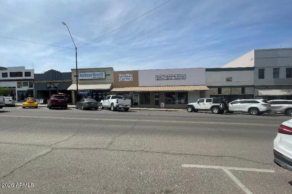 Totally remodeled commercial gem in the heart of downtown Globe. This 5,041 sq. ft. C-3 zoned property offers exceptional flexibility with two storefront spaces currently combined for a clothing store operation. The building features two modern dual-pack A/C units and an electrical panel installed in 2015. Perfect for an owner-user or investor, this property provides the opportunity to run your own business while potentially generating additional income from other space. Ideal for retail, showroom, studio, or a variety of commercial uses. Business available for sale separately by separate bill of sale.