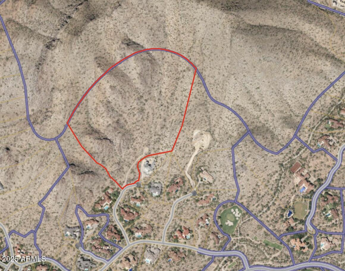 Nestled in the exclusive Upper Canyon of Silverleaf, a rare and exceptional custom homesite spans 30.18 acres, offering one of Arizona's most breathtaking estate opportunities. Perched at 2,200 feet elevation, this property features a vast 139,378 sq. ft. building envelope with stunning, uninterrupted views of the city, mountains, and golf course to the south and southwest. Tucked away in a secluded canyon, the lot borders a desert preserve and sits at the end of a tranquil cul-de-sac, ensuring unmatched privacy and natural splendor.  Architectural renderings and floor plans by CP Drewett are available for review upon request. Plans have been approved by the city see MLS#  6934738.