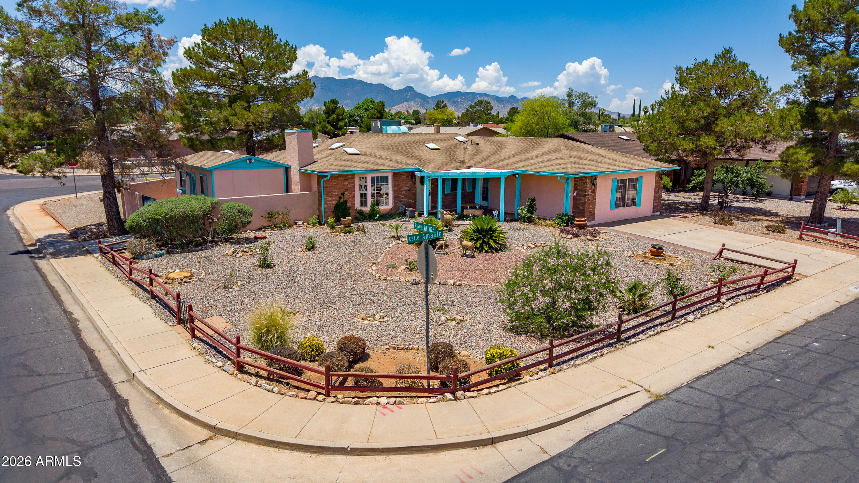 What a beautiful and inviting  4 bedrooms, 2 bath home situated on a corner lot. You're sure to enjoy the wood burning fireplace in the living room. and the bench seat under the bay window.
The kitchen features wood cabinets and granite counter tops and a gorgeous back splash.
Enjoy the Arizona room right off of the dining room that looks out to the backyard 
Leading out to the park like backyard, you will find the  expansive porch that is perfect for barbequing or just hang out. 
  There are 2 large sheds that will convey with the sale. 
 The garage has been converted into a heated and cooled multi purpose room.
  Enjoy added peace of mind with the existing Choice Home warranty good through February 23 2029!