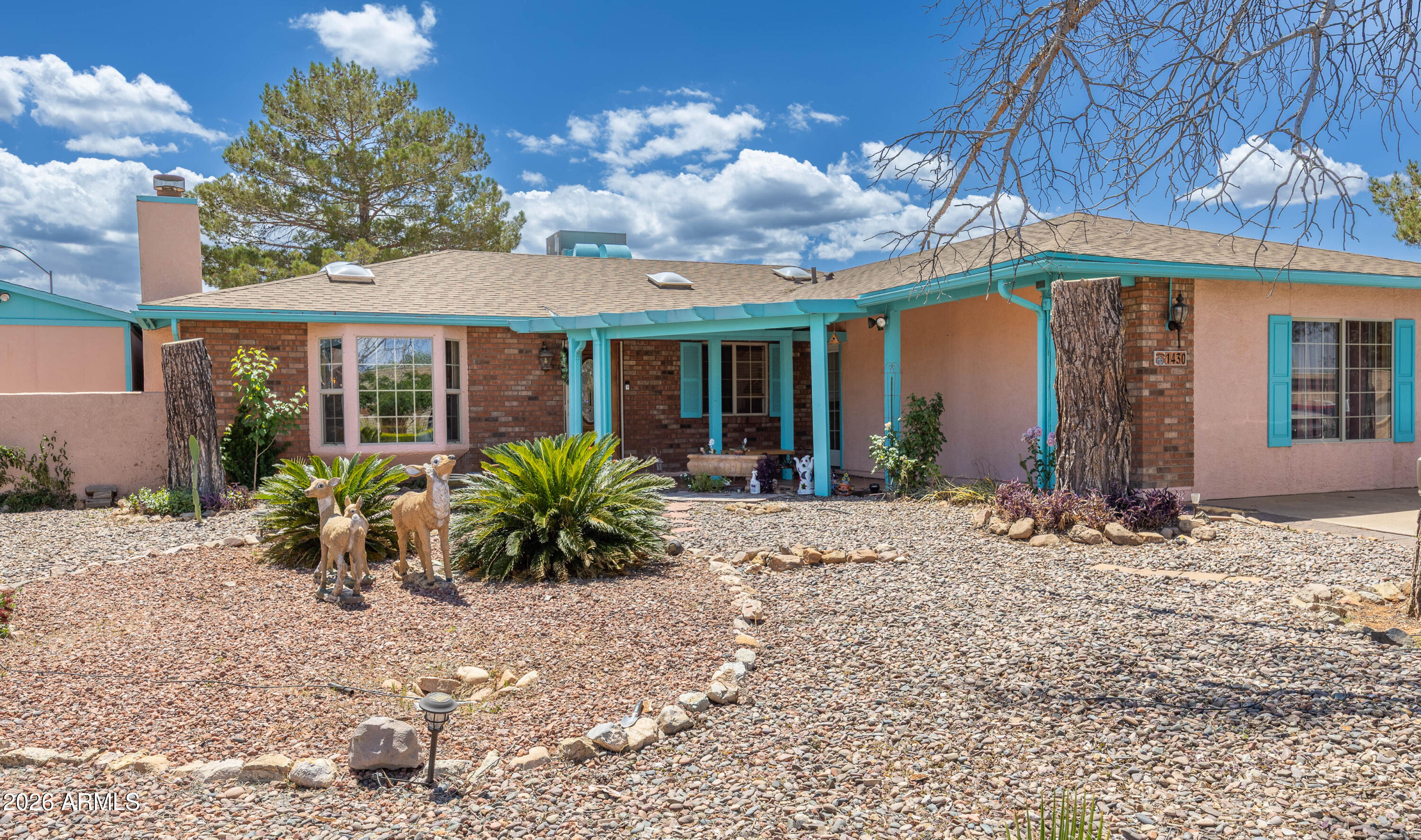 What a beautiful and inviting  4 bedrooms, 2 bath home situated on a corner lot. You're sure to enjoy the wood burning fireplace in the living room. and the bench seat under the bay window.
The kitchen features wood cabinets and granite counter tops and a gorgeous back splash.
Enjoy the Arizona room right off of the dining room that looks out to the backyard 
Leading out to the park like backyard, you will find the  expansive porch that is perfect for barbequing or just hang out. 
  There are 2 large sheds that will convey with the sale. 
 The garage has been converted into a heated and cooled multi purpose room.
  Enjoy added peace of mind with the existing Choice Home warranty good through February 23 2029!