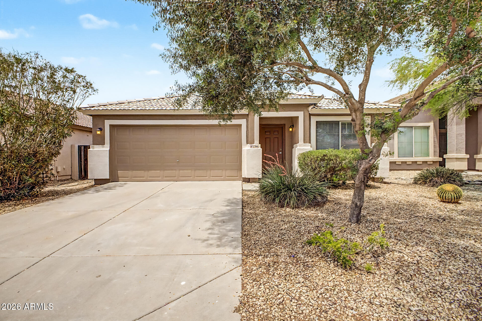 Welcome to the highly desirable Rancho Bella Vista community! This beautiful single story home offers 4 bedrooms, 2 bathrooms, and a sparkling private pool. The open great room floor plan features vaulted ceilings throughout the home, tile flooring, ceiling fans, 2 inch blinds, and pre wired surround sound for comfortable living and entertaining. The spacious kitchen is designed for functionality and style with stainless steel appliances including the refrigerator, a large island, oversized pantry, abundant cabinetry & generous counter space. The kitchen flows seamlessly into the family dining area and expansive family room creating the perfect gathering space. The extra large primary suite overlooks the beautifully landscaped desert backyard and pool area. The primary bathroom features dual vanity sinks, a garden tub extended walk in shower, private toilet room, and a spacious walk in closet. Enjoy fresh exterior paint, a low maintenance backyard, and a fantastic location close to parks, schools, shopping, and dining. This move in ready home offers the perfect blend of comfort, space, and Arizona outdoor living.