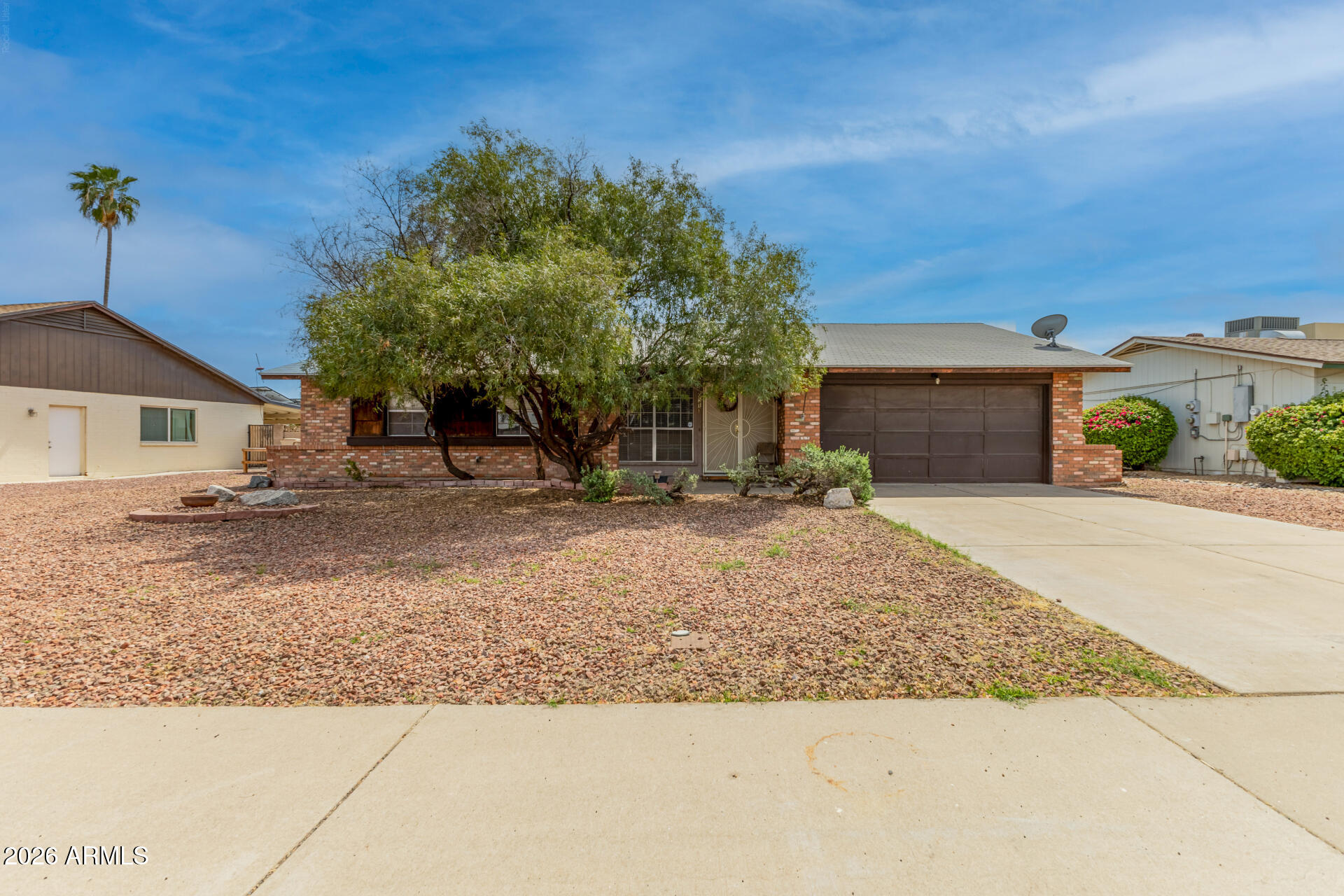 Welcome to this charming single-level home nestled in a well-established Peoria neighborhood. Offering approximately 1,600 square feet, this residence features 2 bedrooms with a den/bonus and 2 bathrooms, providing a comfortable and functional layout perfect for families, first-time buyers, or anyone looking to enjoy easy Arizona living.  

Step inside to discover a spacious living area that flows seamlessly into the dining and kitchen spaces--ideal for both everyday living and entertaining. The home showcases a classic ranch-style design with a welcoming feel, including a great room concept, breakfast area, and bonus space that can be used as a home office, hobby room, or additional lounge. The primary suite offers a relaxing retreat with its own private bath and sitting area, while the additional bedrooms provide flexibility for guests or growing households.

Outside, the property sits on a generously sized lot of nearly 8,000 square feet, offering plenty of room for outdoor enjoyment. A covered patio creates the perfect setting for relaxing evenings or weekend gatherings, and the 2-car garage adds convenience and storage.  

Located in a desirable Peoria neighborhood close to shopping, dining, parks, and major roadways, this home combines comfort, value, and location--making it a fantastic opportunity for buyers.

New price! Seller is relocating. Exceptional value in Peoria; all offers welcome.