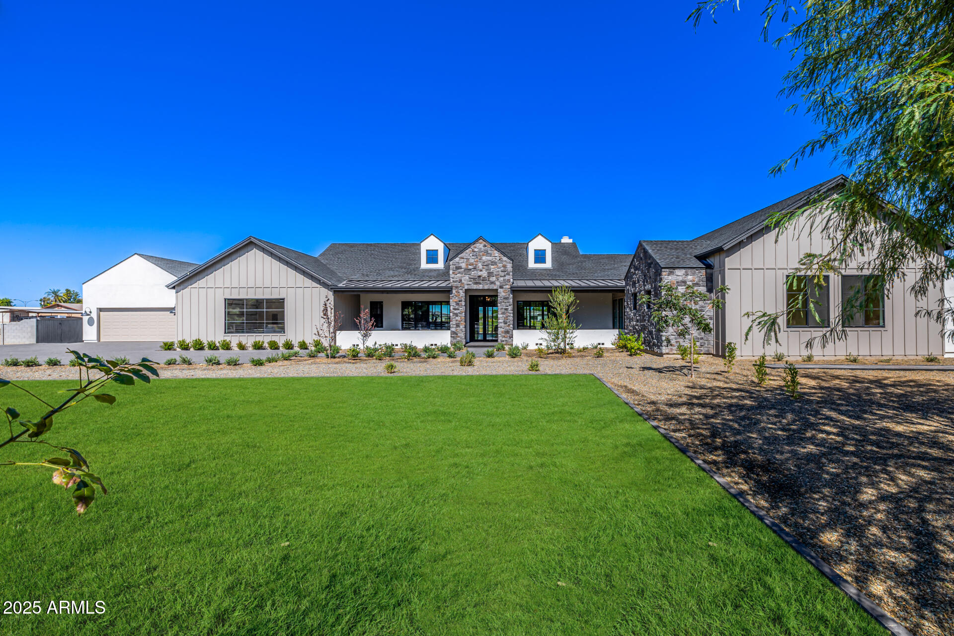 Wow! Awe-inspiring home nestled on a HUGE 1.02-acre lot can be yours! This architectural masterpiece, worthy of a magazine cover, seamlessly blends comfort, luxury, and modern sophistication. Featuring a casita, 6-car garage, stone façade, and mature landscaping that enhances its impressive curb appeal. Sleek interior boasts hardwood flooring, dramatic exposed beams on vaulted ceilings, recessed lighting, and top-quality finishes throughout. You'll love the open den, formal dining room, and expansive open floor plan highlighted by a wood-burning fireplace and multi-sliding glass doors to the back patio. Chef's kitchen is truly exceptional, showcasing abundant cabinetry, marble counters, two center islands, and high-end stainless steel appliances. Grand owner's retreat won't disappoint. Direct outdoor access, a spacious walk-in closet, and a lavish ensuite comprised of a garden tub and a floor-to-ceiling tiled shower complete the picture. A versatile bonus room provides endless possibilities for work or play. Let's not forget about the generous sized backyard, which includes a covered patio and swimming pool. This rare find has everything you've ever dreamed of! Hurry!