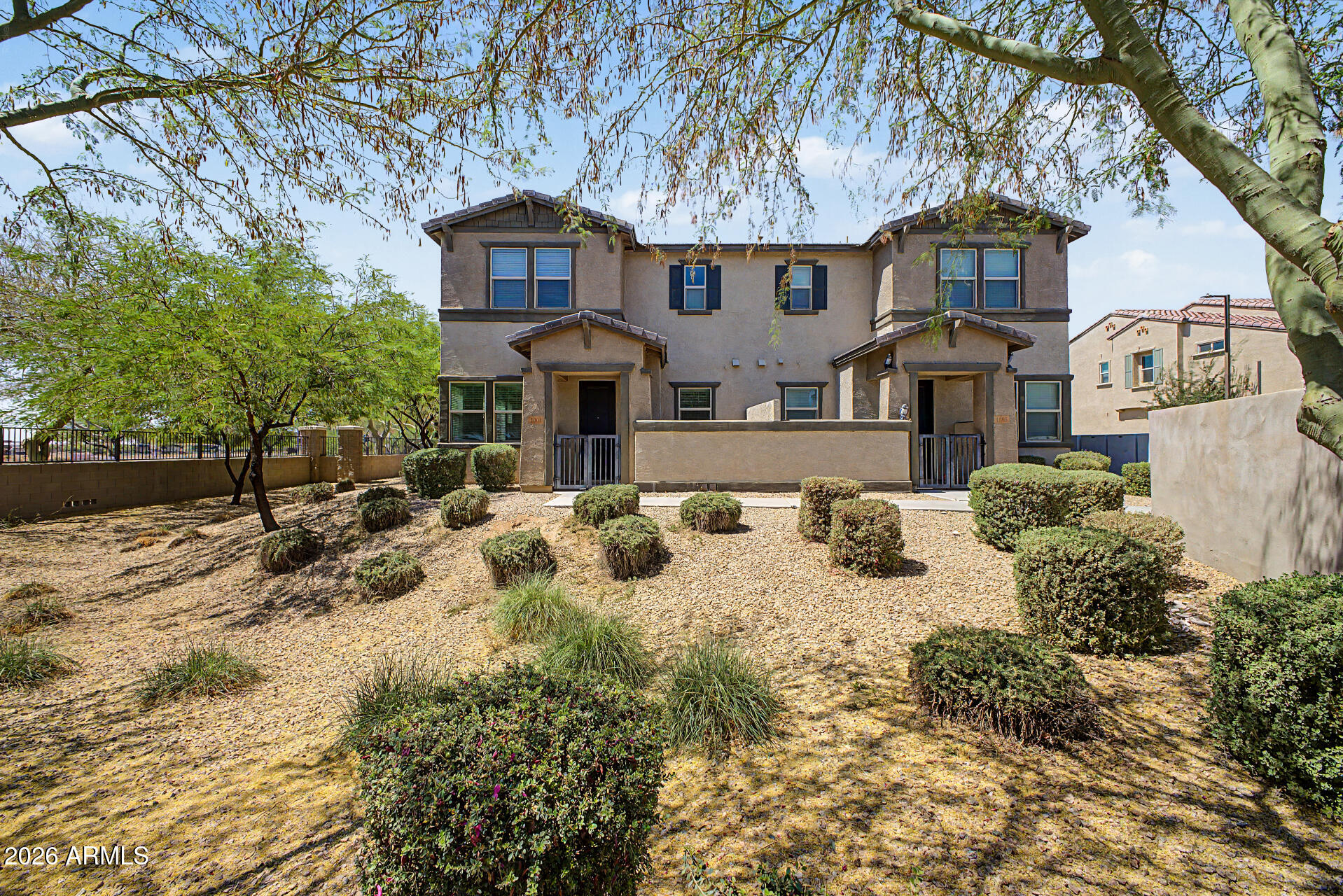 Welcome home! Move-in ready 3 bed/3 bath townhome with a 2-car garage in a gated community. Features wood-look tile in main living areas, granite countertops, kitchen island with breakfast bar, dark wood cabinetry, walk-in pantry, and an open-concept layout perfect for entertaining. Spacious primary suite with dual sinks and walk-in shower. Includes water softener and all major appliances, making this home truly turnkey and low maintenance. Enjoy a sparkling pool, spa, and fitness center. Located in a highly desirable, walkable area near Lifetime Fitness, Harkins, Trader Joe's, First Watch, Shake Shack, CAVA, and shopping including Nordstrom Rack. Quick access to I-10 & Loop 303, plus exciting new development including Buc-ee's. Priced to sell!
