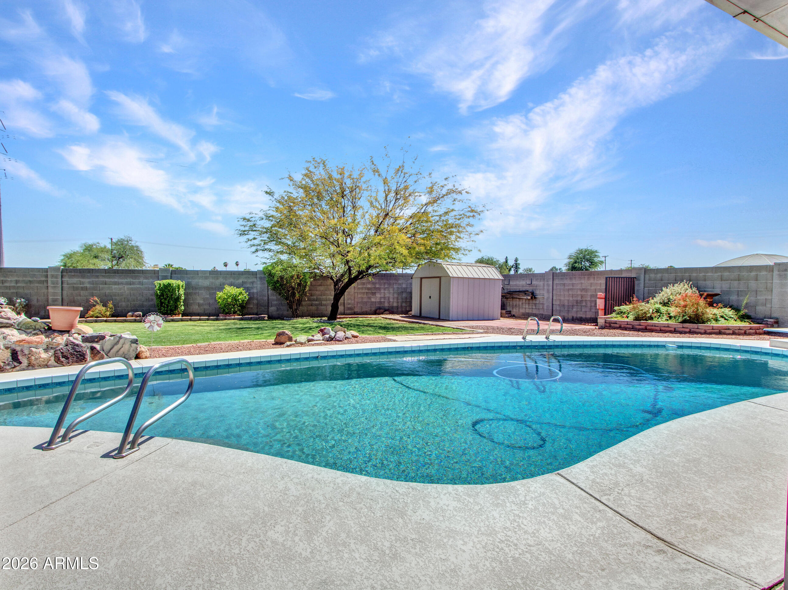 Welcome home to this beautifully refreshed Glendale property, ideally situated on a desirable north/south-facing lot in the established Continental North neighborhood. An inviting foyer entry welcomes you inside, where natural light fills the home through a skylight that brightens the living spaces. Recent updates include fresh interior and exterior paint, refreshed bathrooms, and inviting living areas designed for both everyday comfort and entertaining.

The formal dining room provides the perfect setting for holiday gatherings and special occasions, while the spacious Arizona room offers additional flexible living space overlooking the backyard.

Step outside to your own private retreat ... featuring a large diving pool, lush lawn, and ample room for gardening, outdoor entertaining, pets, or play. Whether you're hosting summer pool parties or cultivating a garden oasis, this backyard offers endless possibilities.

Conveniently located near neighborhood parks, recreation areas, shopping, dining, and everyday conveniences. Enjoy easy access to I-17 and Loop 101, making commuting throughout the Valley simple and efficient. Nearby parks, walking paths, dining, and retail destinations provide the convenience today's buyers are looking for, while Arrowhead-area shopping, entertainment, and services are just minutes away.

This move-in-ready home combines thoughtful updates, exceptional outdoor living, and a convenient Glendale location--offering the perfect place to live, relax, and enjoy the Arizona lifestyle.  

**INQUIRE ABOUT LENDER INCENTIVES**