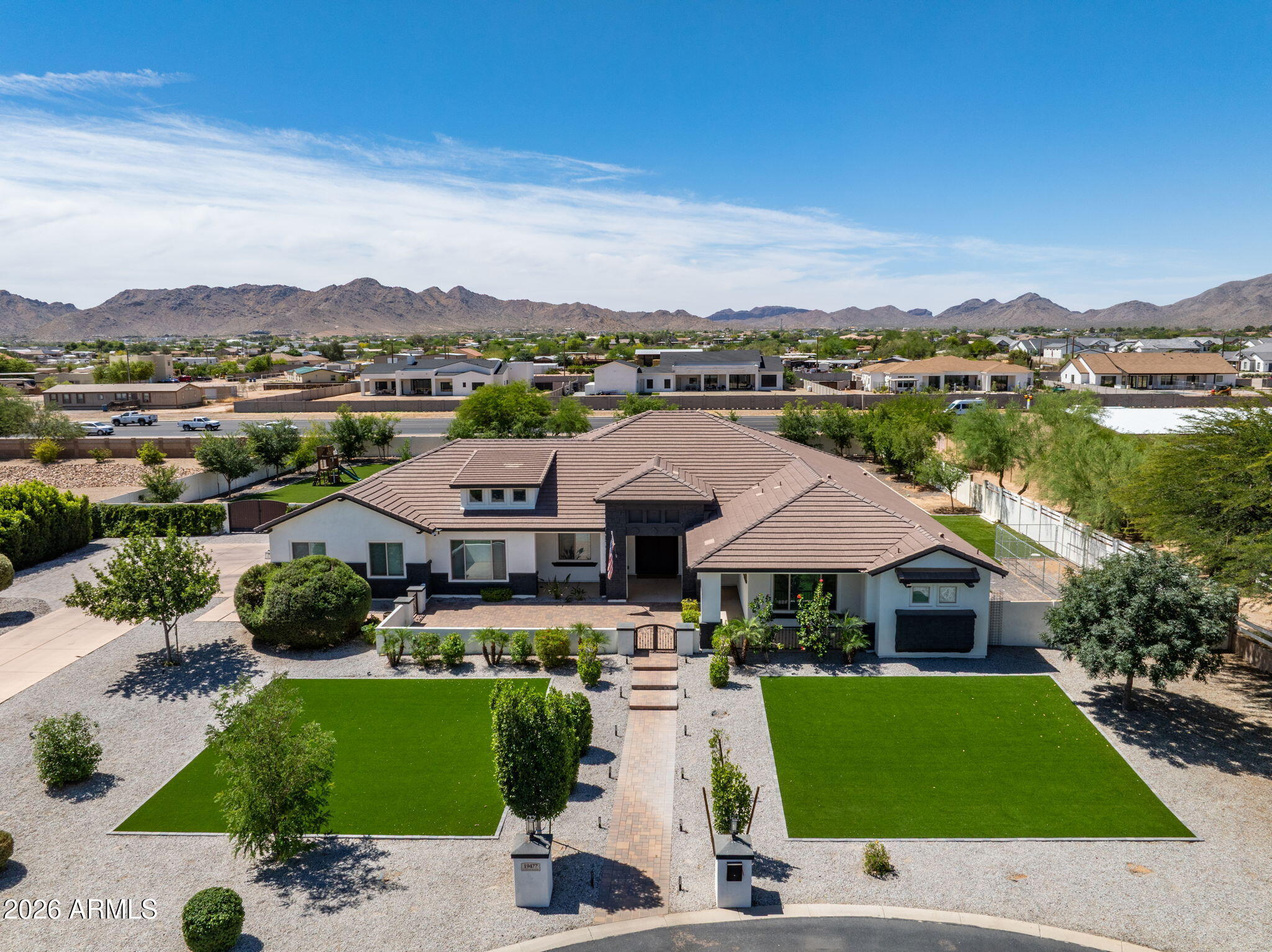 Welcome to Country Meadows. A home where lifestyle, acreage, and beautiful living intersect. Set on a full acre, this luxury home offers the space you are searching for along with style and comfort. Recent improvements totaling more than $250,000 have elevated the home throughout, while the stunning beach-entry pool, added in 2023, creates a true backyard retreat. Large living spaces, designer finishes, and a highly functional floor plan make everyday living as enjoyable as entertaining. Whether it's room to spread out, space for toys, or simply enjoying Arizona sunsets from your own private oasis, this is the kind of property that rarely comes along. Move-in ready, able to hold everything you love, and designed to curate relaxing or fun moments. Welcome home.