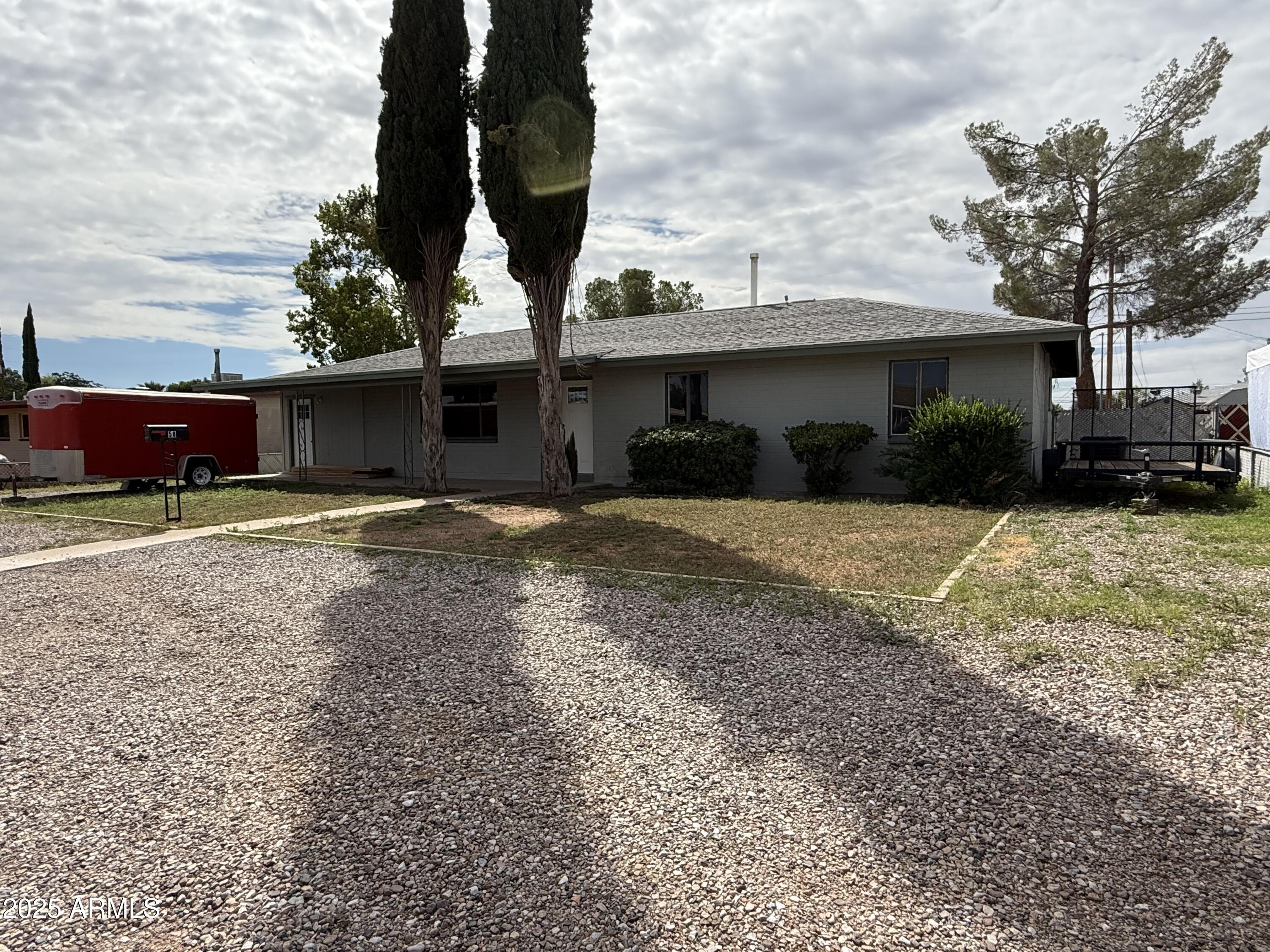 This wonderful home is ready for new owners! You will love the light in this home! There is a good sized living room as well as a dining area. The kitchen has newer appliances and the cabinets have been redone in the past. There is also a breakfast nook! You will love the extra room off of the nook, it is a perfect office, workout room, or even an extra bedroom. There is a nice sized laundry room with extra storage. The bedrooms are good sized and have newer ceiling fans. The master bedroom looks out to your private backyard. The baths have had some updating. Step out into the backyard and you will see a storage shed and the backyard has an RV gate off the Alley. There is also room out front to park an RV as well.