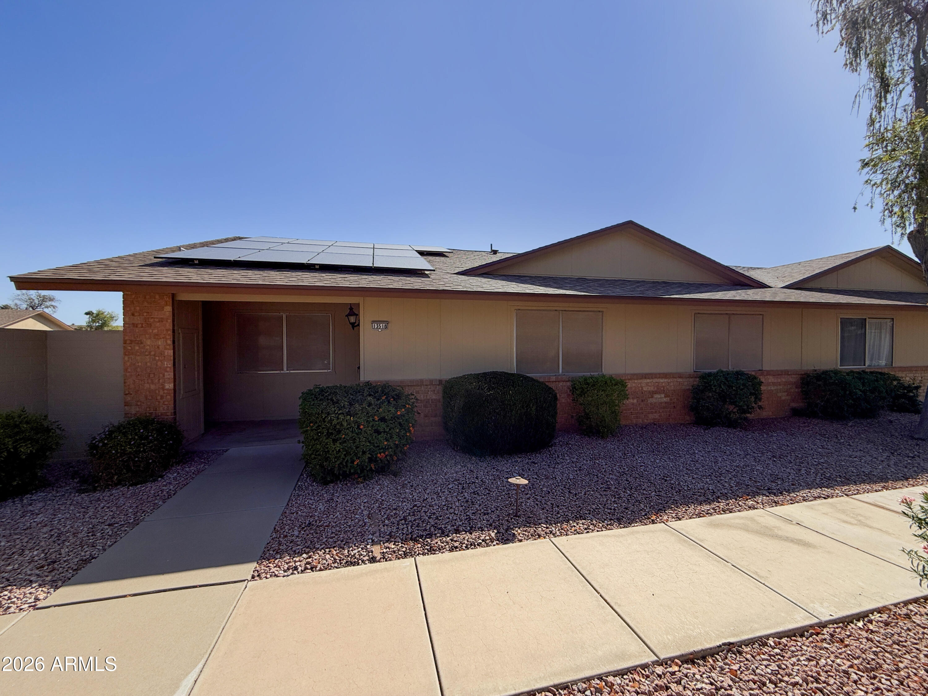 2-bedroom 2 bath home with open floor plan kitchen over looks living room a dining area. Covered patio with backyard with fruit trees. Garage has cabinets for storage. Community Features: Biking/Walking Path; Clubhouse/Rec Room; Comm Tennis Court(s); Community Media Room; Golf; Pickleball; Workout Facility.