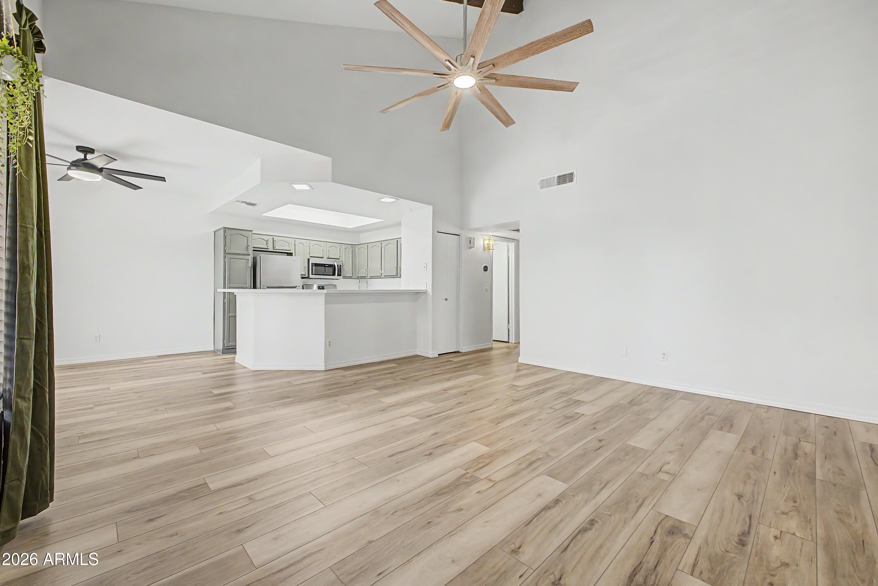 Stunningly renovated! Rare opportunity to own a beautifully reimagined 2-bedroom, 2-bath, second-story condo, showcasing some of the best lake views in the entire community. Perfectly positioned for both privacy and scenery, this premium location sets the home apart.

Inside, you're welcomed by soaring vaulted ceilings and a bright, open layout filled with natural light. The recent upgrades strike the perfect balance of style and comfort, featuring new luxury vinyl plank flooring, elegant quartz countertops, thoughtfully selected modern lighting and fixtures throughout, and much more. The open living space is both inviting and functional, ideal for relaxing or hosting guests. With its thoughtful upgrades and cohesive modern design, this residence offers a true turnkey experience. If you're looking for elevated living, refined finishes, and one of the most desirable settings in the complex, this is the one.