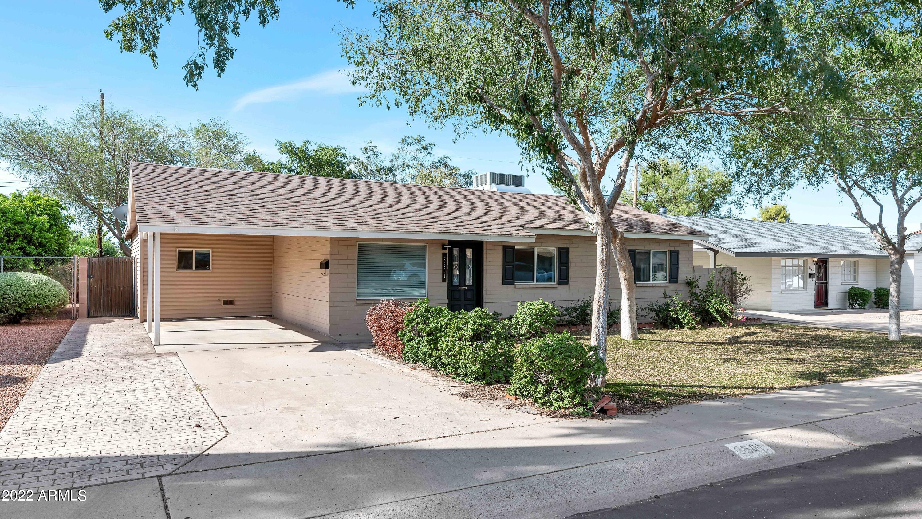 Location!! Walking distance to Biltmore Shopping and The Esplanade. Beautiful landscape surrounds this centrally located property. A bright welcoming interior w/neutral colors, updated light fixtures, eat-in kitchen is fully equipped w/ample cabinetry & newer stainless-steel appliances. Entertain your guests in the private backyard w/large, covered patio, pavers, exotic Elm shade trees give privacy and plenty of backyard space for customization. Great home and value for this area!
