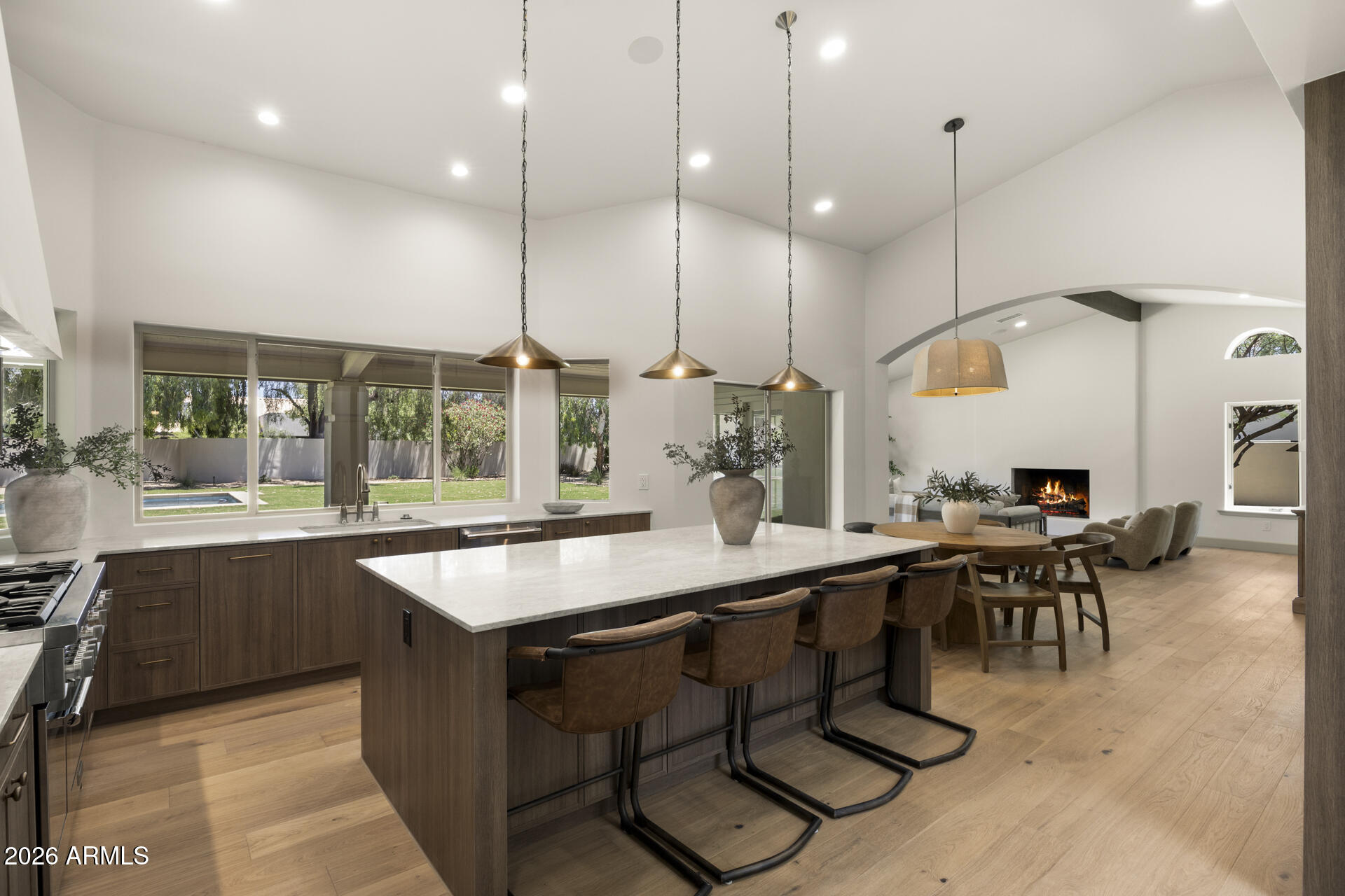 A complete reimagining in the heart of Scottsdale's coveted Cactus Corridor, this 5 bedroom, 3 full bath, 2 half bath residence blends timeless architecture with warm organic design. Thoughtfully reworked to appeal to a wide range of buyers, the floor plan offers seamless flow, generous living spaces, and an effortless indoor-outdoor lifestyle.

Curated finishes include custom cabinetry, natural stone surfaces, wood flooring throughout, and a premium Thermador appliance package. Nearly every major component of the home has been upgraded, including new AC units, tankless water heaters, and extensive interior and exterior improvements, creating a true turnkey experience. Set on an exceptional Cactus Corridor lot, the backyard was designed for both everyday living and entertaining, featuring a newly constructed pool, expansive outdoor spaces, and mature desert surroundings that create a private resort-like setting. A rare opportunity to own a fully renovated home in one of Scottsdale's most desirable locations.