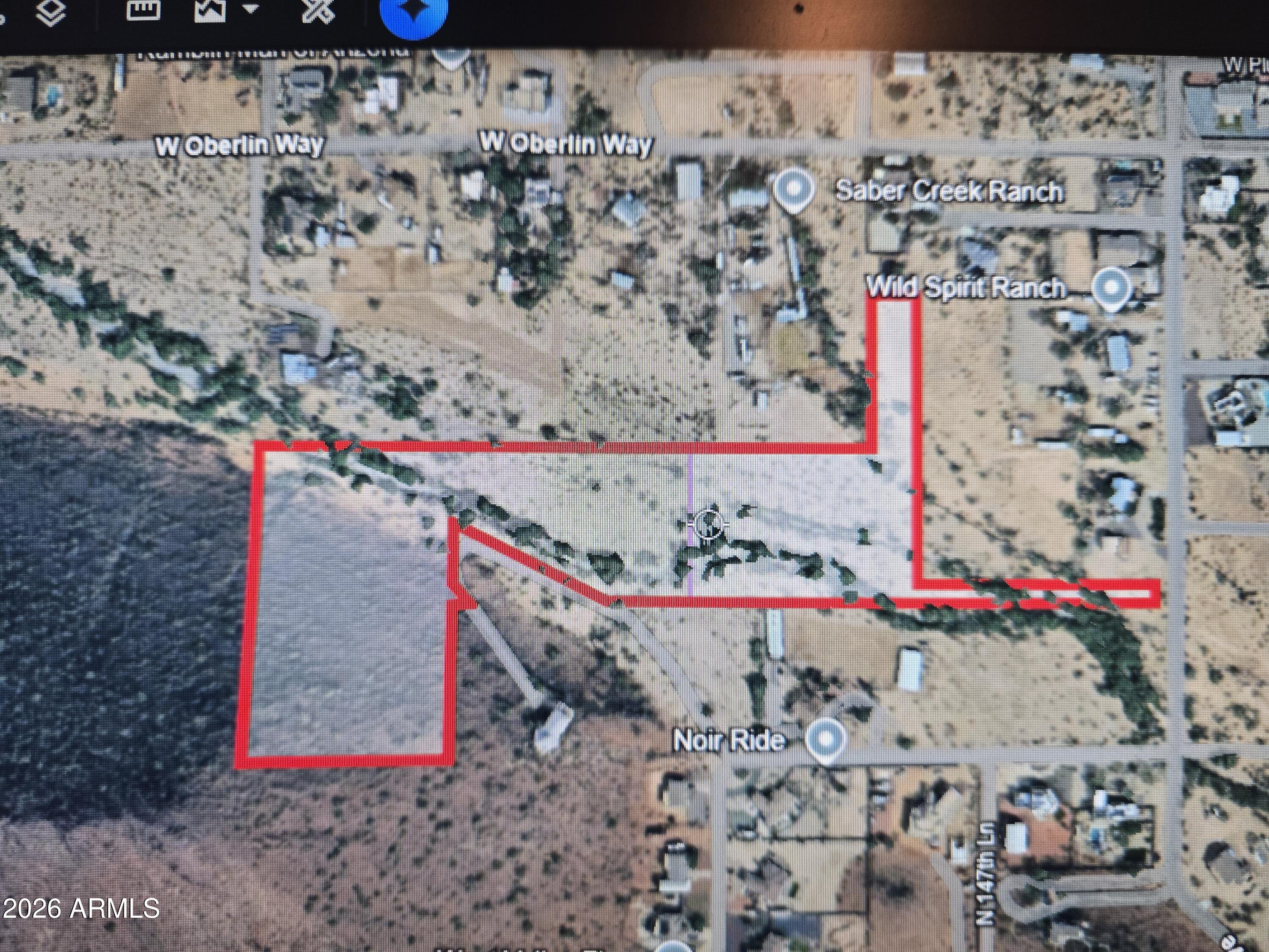 Over 14 acres connected within 4 separate parcels. The parcels contain some flat land, some wash, some hillside.