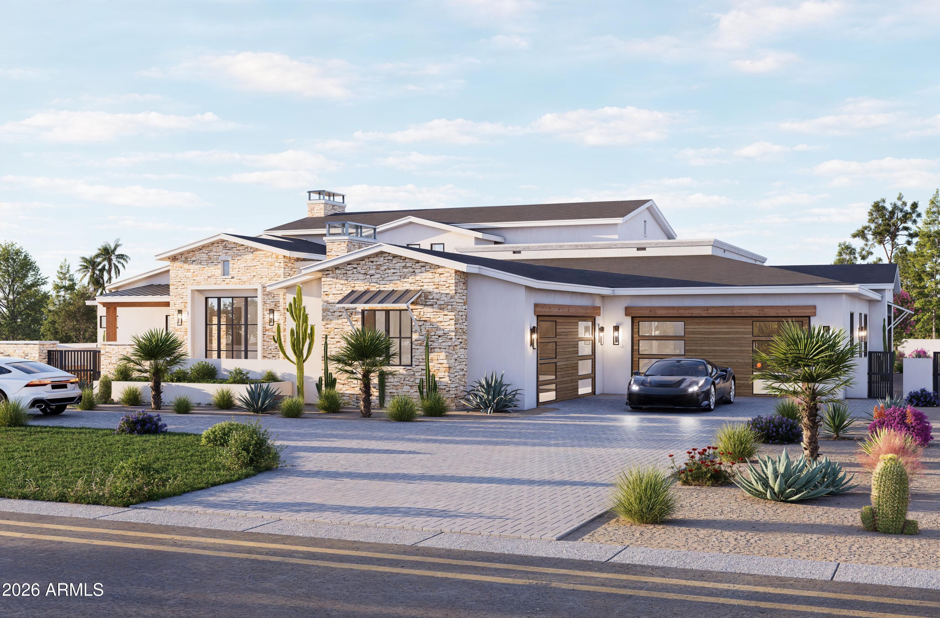 Planned completion Summer 2026.

This custom residence, built by Armstrong Construction Group and designed by Tom Mooney Design, blends modern luxury with timeless architecture. The main home offers 6,294 SF with 4 beds, 5 baths, an office with separate entrance, and a kids flex room. All this is  complemented by a 677 SF 1 bed/1 bath guest house, all set on just under an acre. Room to add pickleball court if desired.

Interiors curated by Janet Brooks Design feature stunning charcoal and warm toned millwork along rich pecan-colored wood flooring. The open floor plan is filled with natural light and includes a chef's kitchen with a hidden back kitchen, a separate pantry, a secondary living wing, and an oversized laundry room with dual washers and dryers plus dog wash for Fido. The primary suite and office occupy a private wing, with the office offering its own entrance and patio. Outdoor living showcases an extended pool, ramada with fireplace, and generous entertaining areas designed for year round enjoyment.