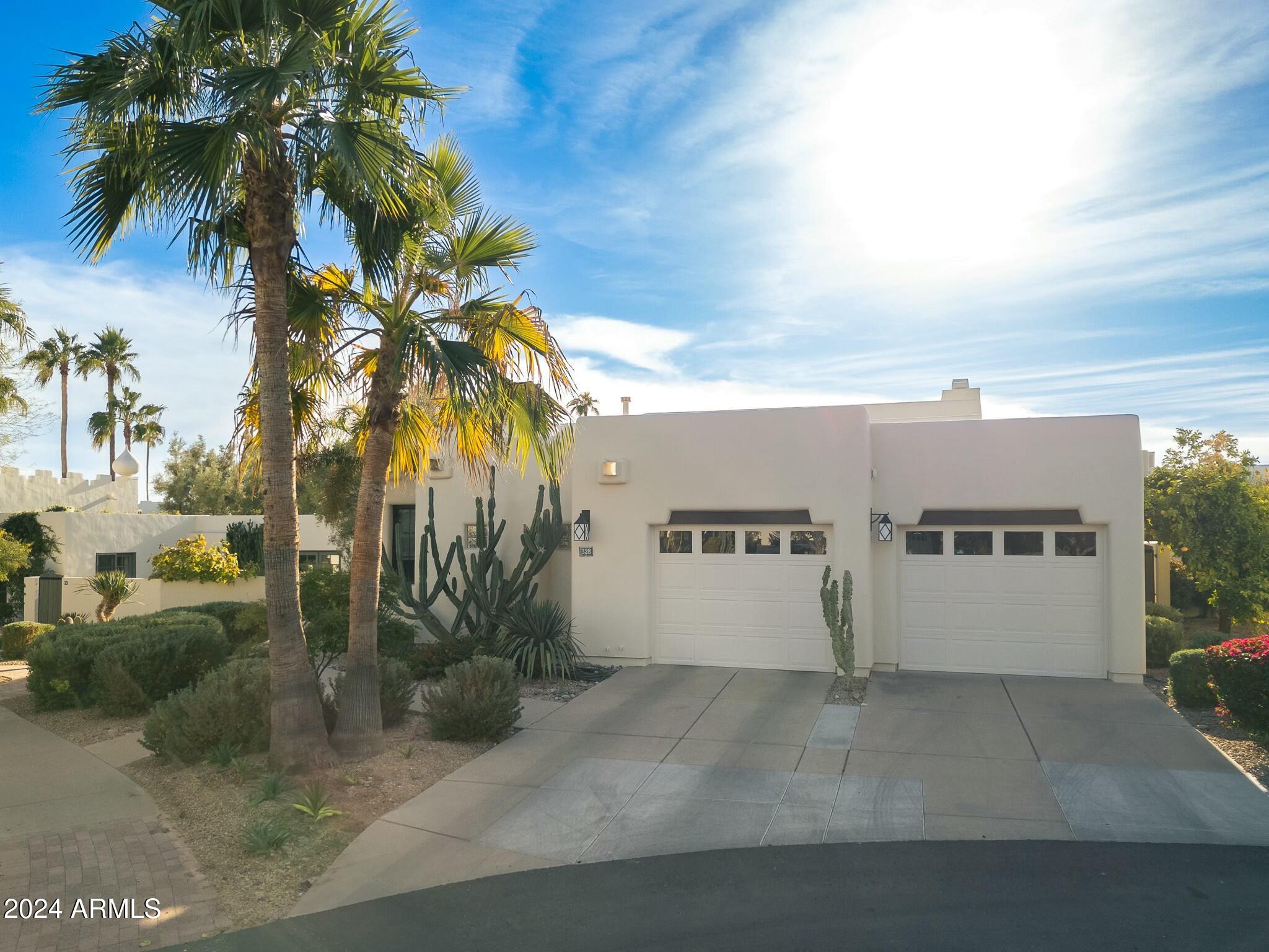 Welcome home to this beautifully remodeled single-family residence in the prestigious, guard-gated Casa Blanca Community! Nestled on one of the largest lots in Casa Blanca, this exquisite property offers 2,486 square feet of meticulously updated beauty and sophistication.

This 2-bedroom, 2.5-bath home with an attached 2-car garage has undergone a complete transformation, leaving no detail untouched. The extensive upgrades include:
A brand-new chef's kitchen with premium finishes and appliances.
Fully renovated bathrooms, designed with modern elegance and functionality.
Updated lighting fixtures and window treatments, adding warmth and style throughout.

Step outside to your private outdoor retreat, featuring thoughtfully landscaped vignettes and lush greenery. This space is truly an entertainer's dream, ideal for hosting gatherings or enjoying peaceful evenings under the stars.

Key Features Include:
Spacious Layout: 2,486 SF of open-concept living with elegant finishes throughout.
Modern Upgrades: Fully remodeled chefs kitchen and bathrooms featuring high-end materials and design.
High End Appliances: Including Sub-Zero/Wolf
Outdoor Oasis: Lush landscaping in an inviting backyard, ideal for entertaining or unwinding.
Prime Location: Nestled within the highly sought-after Casa Blanca community, offering 24/7 security and a tranquil environment.  
Close to Old Town Scottsdale: Dining and Entertainment, Hiking, Biking, Swimming, Golf, Tennis, and Pickleball are all a short distance away.

For a full list of upgrades, please refer to the documents tab. This home is the epitome of style, comfort, and luxury. Don't miss your chance to own this one-of-a-kind property.  Welcome Home