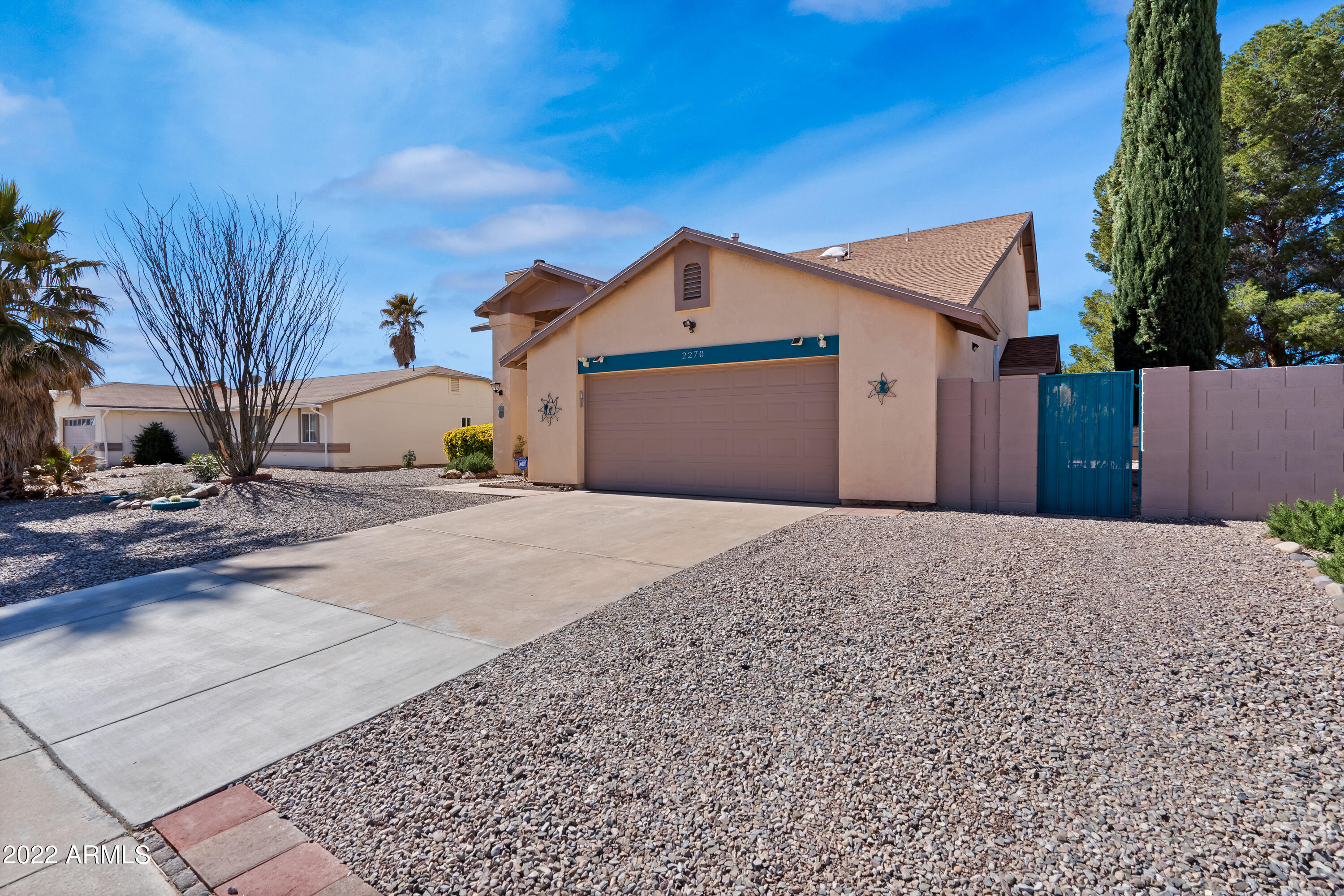 Stunning 3 bedroom 2.5 bathroom 2 story home. Primary suite is split from living and other bedrooms located on the bottom floor. Gorgeous kitchen with island. Dining area off the kitchen is large enough for any sized table. Like to be outside?? Enjoy the beautifully landscaped yard that backs up to vacant land.  Pride of ownership is apparent in every corner. This house has been perfectly maintained. You want to be close to town, shopping, Ft Huachuca? Here it is right in the heart of Sierra Vista.