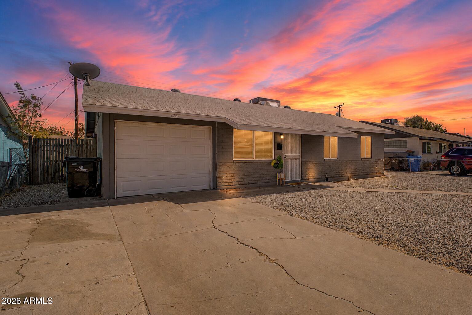 Fall in love with this beautifully updated Phoenix gem! Offering 3 bedrooms, 2 bathrooms, and 1,260 sq. ft., this move-in-ready home combines modern upgrades with everyday comfort. The inviting floor plan features updated flooring, a bright and open living space, and a stunning kitchen with quartz countertops, stylish cabinetry, and stainless steel appliances. Step outside to a spacious backyard with a covered patio--perfect for entertaining, weekend BBQs, or creating your dream outdoor oasis. Conveniently located near shopping, dining, parks, schools, and major freeways, you'll enjoy easy access to everything Phoenix has to offer. Homes with this combination of updates, charm, and value don't come along often!