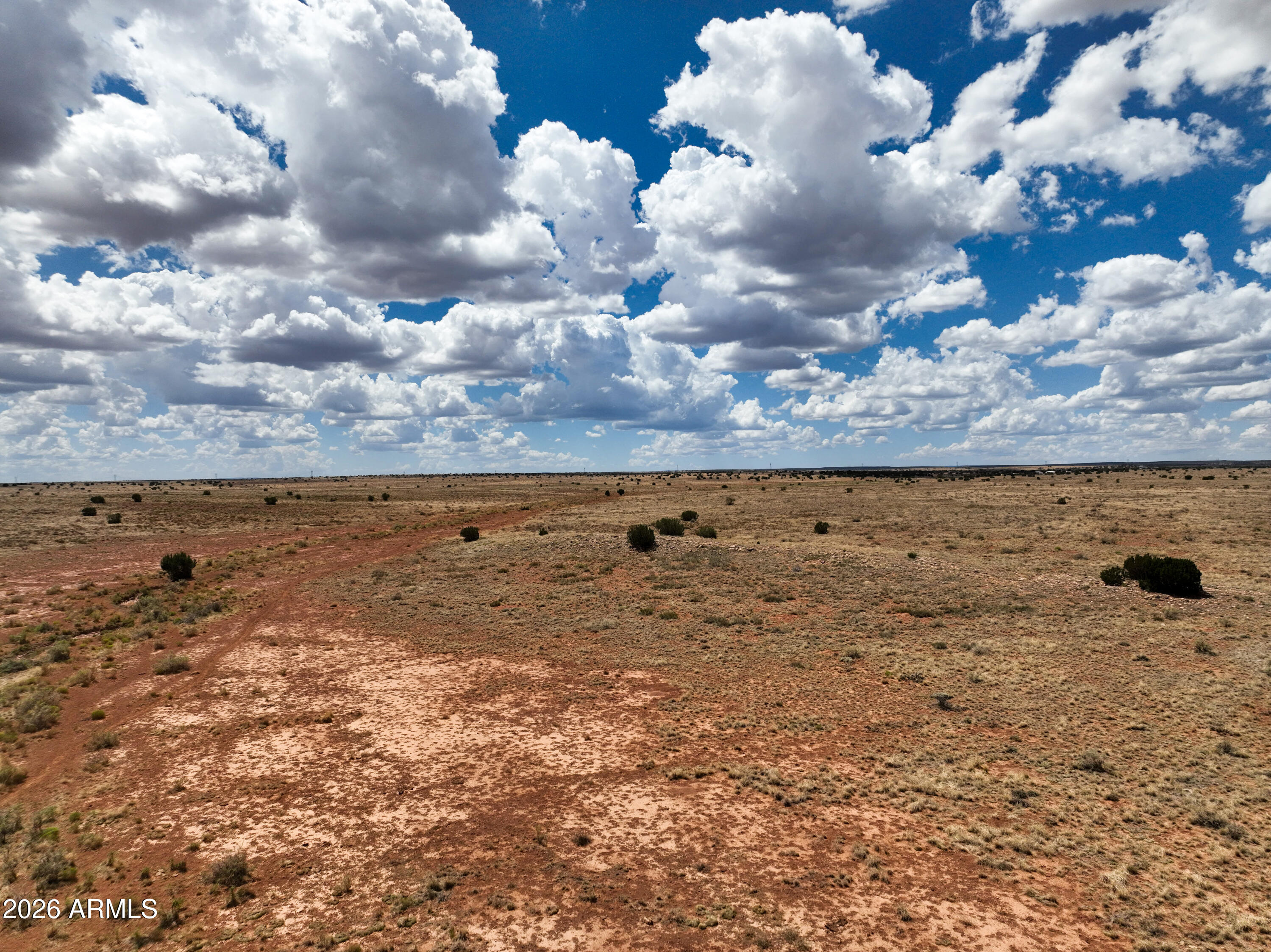 Ranch land that borders State Land to the West. Remote, private and peaceful. Located at an elevation of approx. 5600. See associated docs for location. GPS co-ordinates are: Latitude: 34.63543, Longitude: -110.50244. There is no sign on the property.