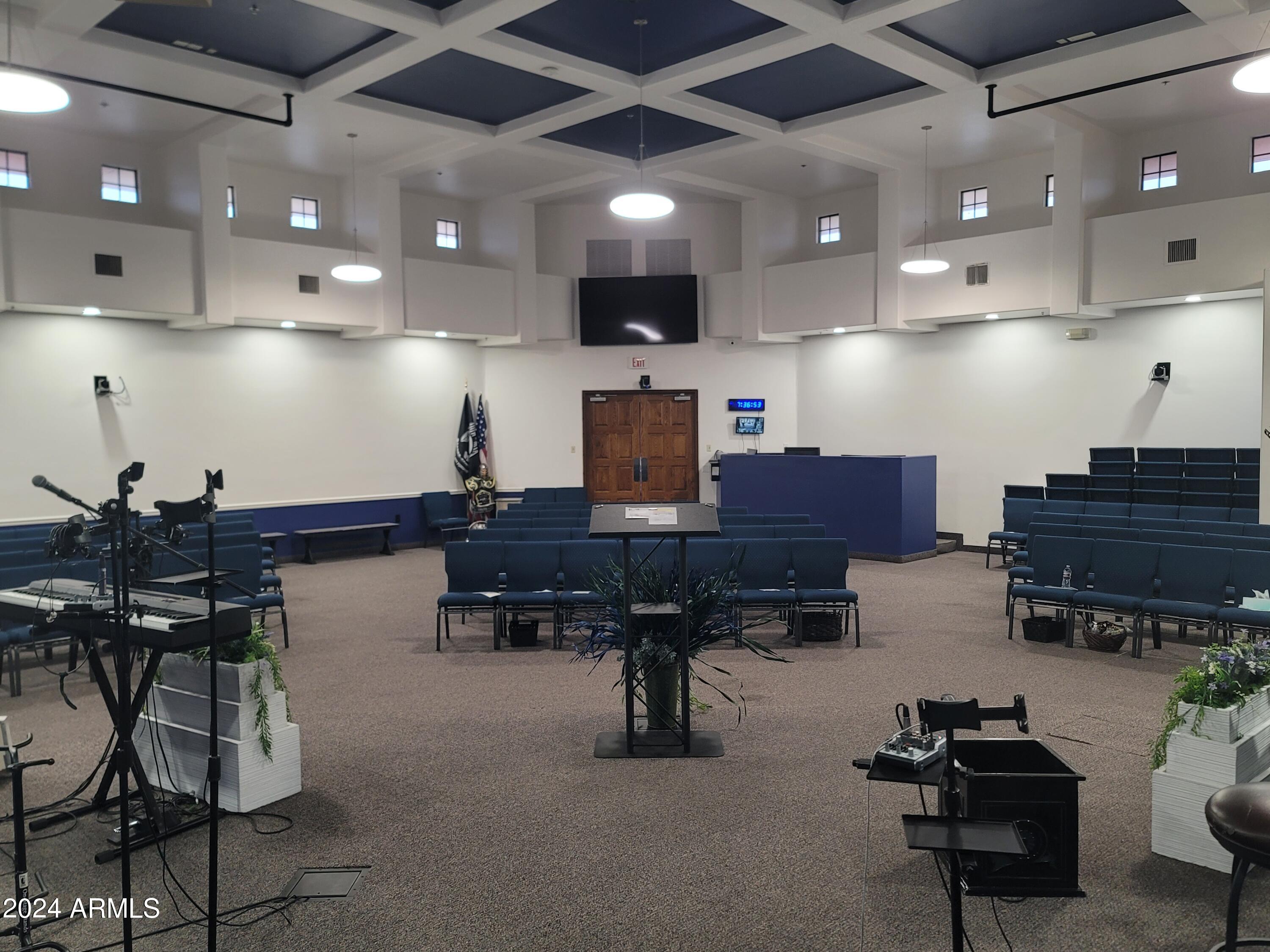 This is a shared sanctuary space with 2 classrooms and a quiet-room. East Valley - Higley and Warner Rd. in Gilbert 85296. Seats up to 125 people. Available Times for lease: Saturday all day; Sunday 1pm to 8pm and Tuesday or Wednesday 6 to 9pm. Includes use of: Sanctuary, Lobby, 2 Classrooms, Restrooms, Parking lot, Sound System, Video projector system, Electric Keyboard, Microphones, and Lectern. Rent includes utilities and customary maintenance. Close to freeway access at Loop 202.