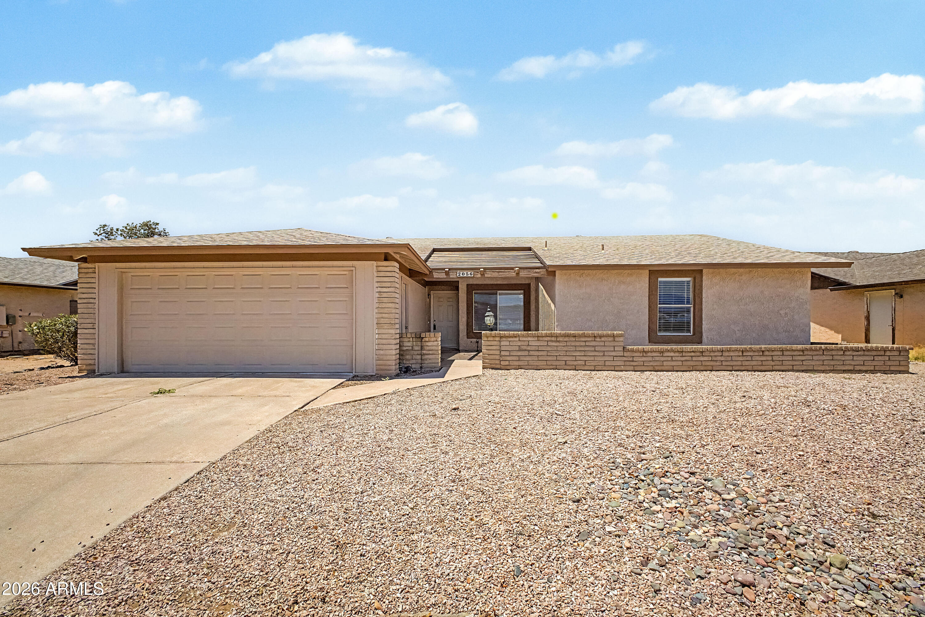 This home has so much to offer! From the minute you walk up to the courtyard at the front entrance, you will begin to recognize the wonderful features of this home. Upon entry, you will experience a charming, sunken living room as well as a tiled entryway which opens into another living area which could be utilized as a formal dining room or opt for another living area (or even a game room). The kitchen has been updated with white shaker cabinets, & granite counters, stainless steel GE appliances. There is a family room off of the kitchen and the other 2 bedrooms down the hall. The Owner's bedroom is split from the other bedrooms and opens with French Doors & brand-new carpet. The en-suite bathroom has a gorgeous, tiled shower, a vanity w/ granite countertops, & a spacious, walk-in closet.