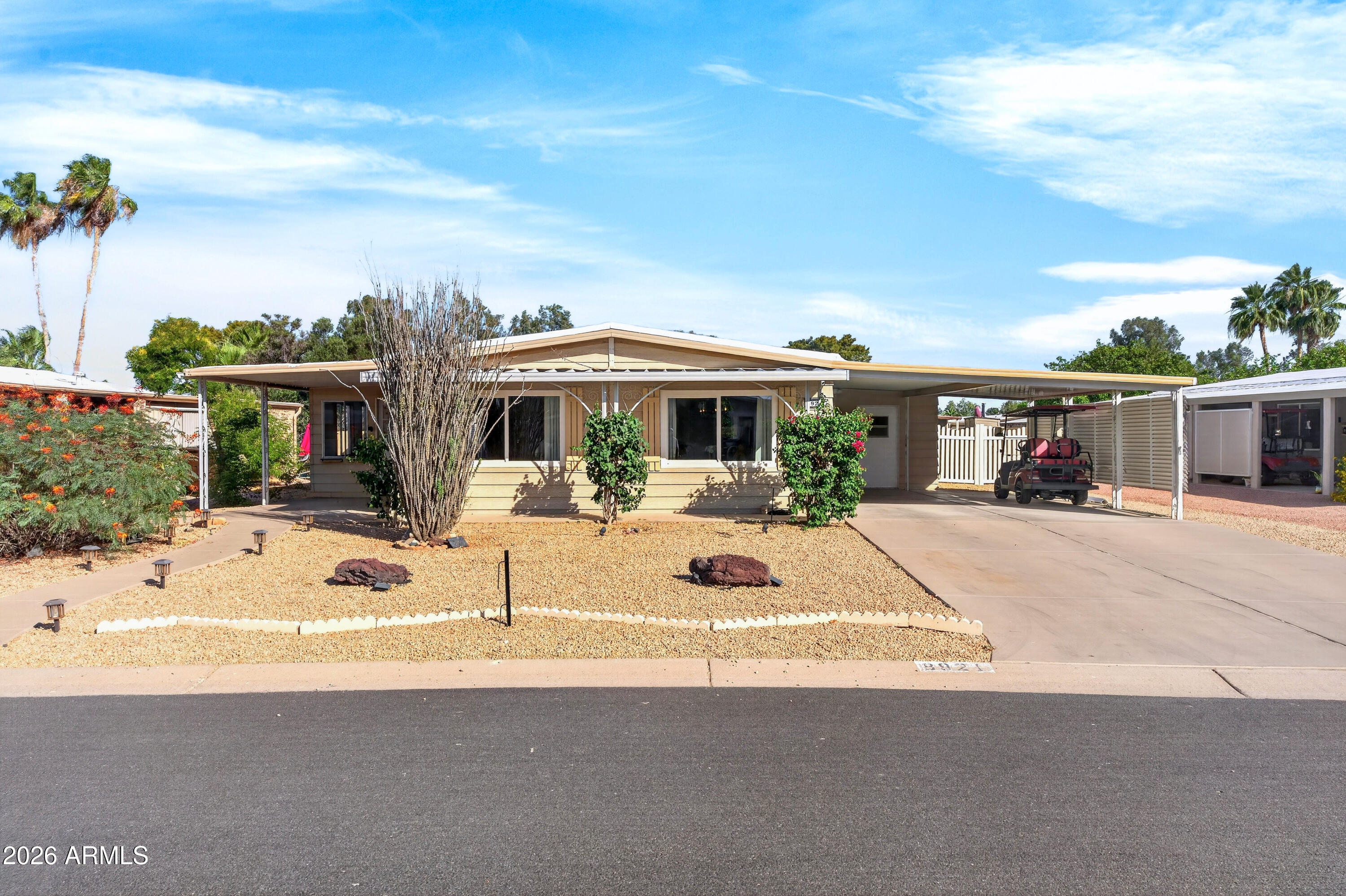 Located just moments from the clubhouse in the highly sought-after Sun Lakes Active Adult Community, this move-in ready 2 bedroom, 2 bath home offers an ideal floor plan and incredible charm! Enjoy resort-style living with golf, pools, fitness centers, pickleball, tennis, restaurants, social clubs, and endless activities. You'll love the finished Arizona room for additional living space, an updated guest bathroom with a beautiful walk-in shower, and a spacious shed/workshop perfect for hobbies or storage. Enjoy peace of mind with a newer HVAC and water heater (2023). The north/south exposure keeps the home light and bright, while the fenced backyard is perfect for pets and outdoor enjoyment. A 2-car tandem carport adds convenience. This is more than a home--it's a lifestyle!