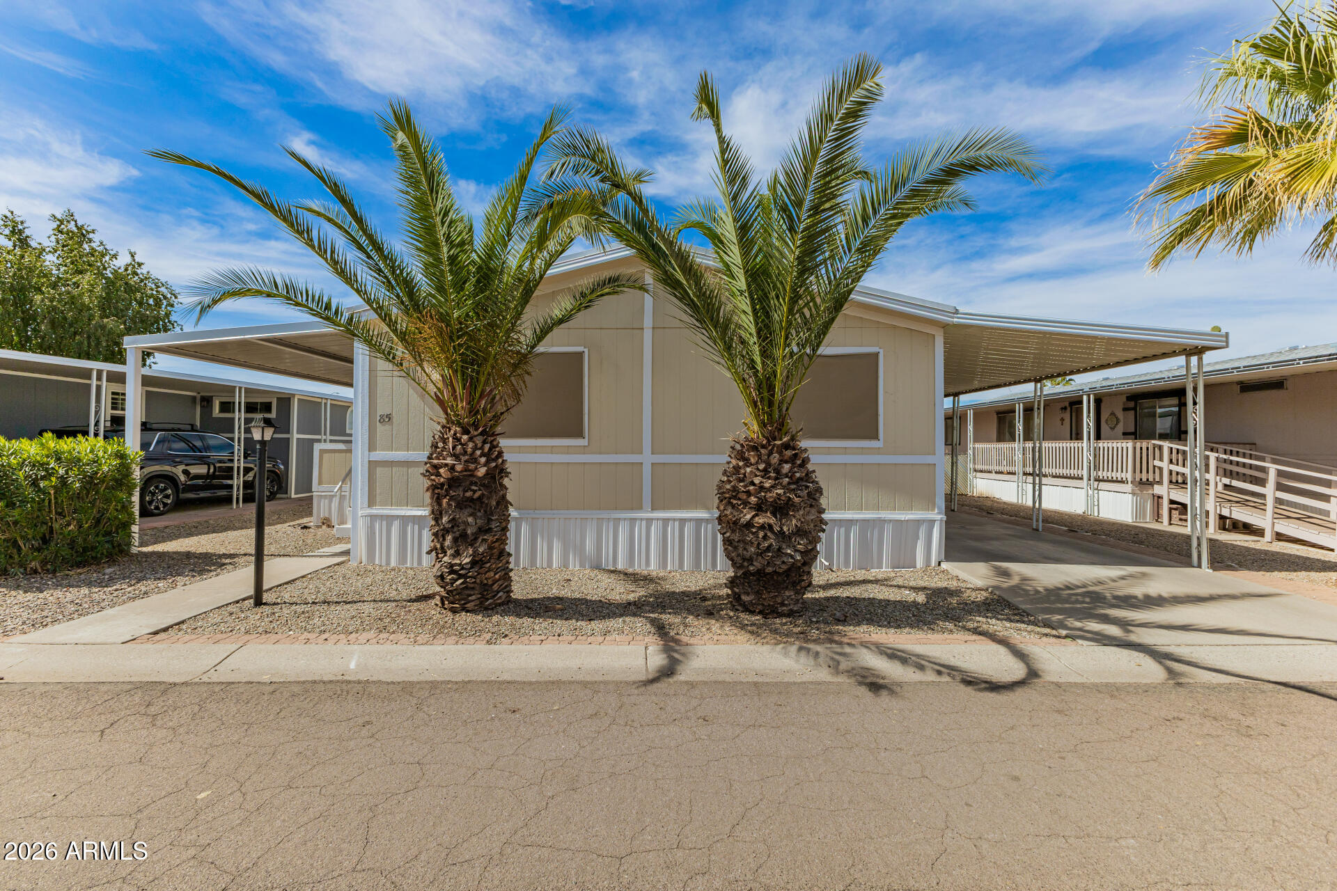 This charming Updated 3-bedroom, 2-bath mobile home in the All Ages Suncrest MHP is the one! Fully Updated in 2024. You're greeted by a welcoming front porch, perfect for enjoying morning coffee. Inside, you'll find an appealing open layout with vaulted ceilings, a soothing palette, blinds, and stylish wood-look flooring. The well-appointed kitchen comes with granite counters, white shaker cabinets, a subway tile backsplash, and stainless steel appliances for a delightful cooking experience. The main bedroom features soft carpeting, a closet with mirrored doors that enhance the sense of space, and a private bathroom with dual sinks. Unwind in the backyard, which offers a shed for additional storage. Don't miss out on this one!