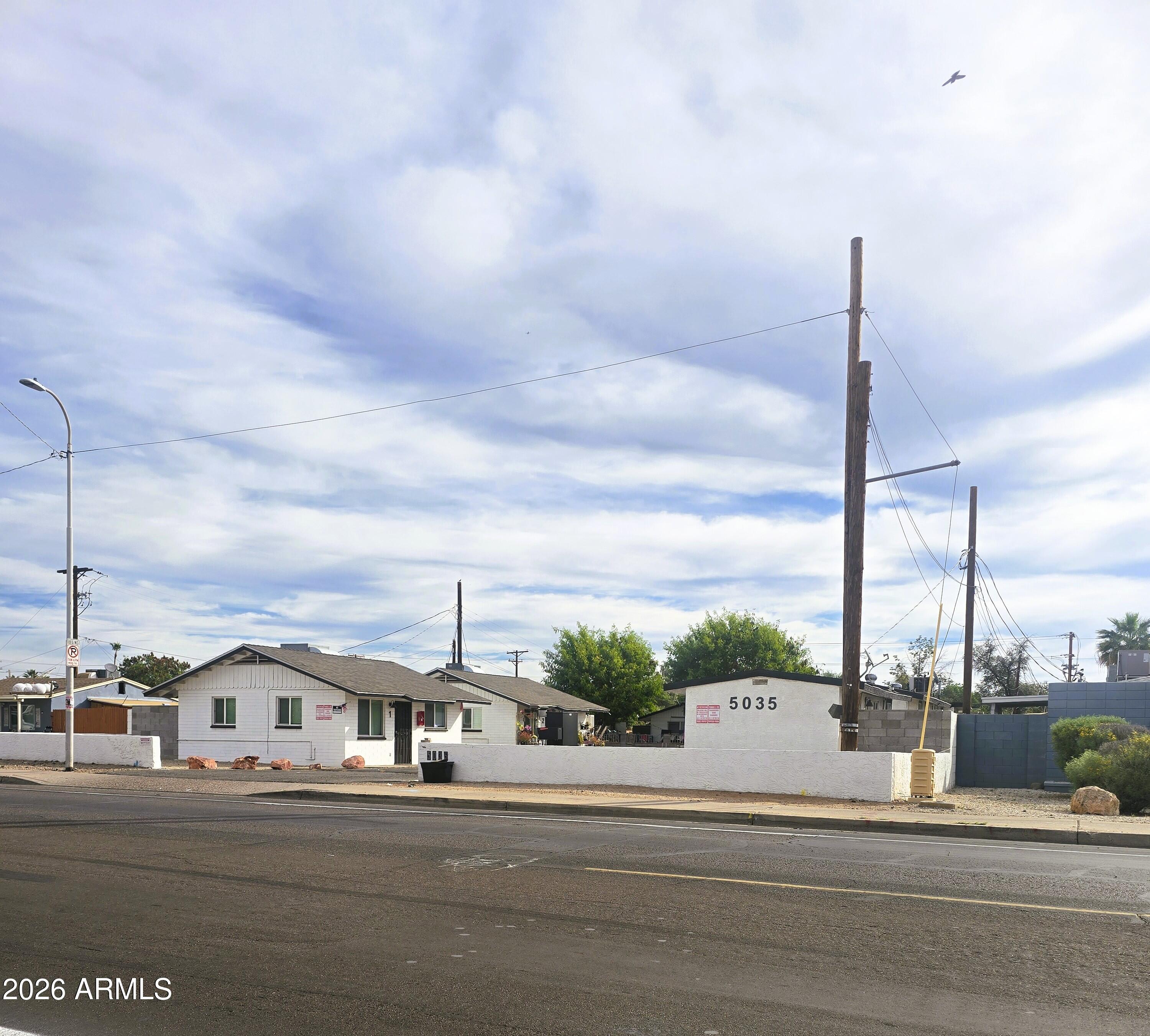 Uptown PHX 9-unit complex spread out over close to a 25,000-sf lot with R-3 zoning. 7.2 CAP off 2025 P&L w/ 100% occupancy. Nice pocket north of Camelback Road, 1 mile east of GCU & 1/2 mile east of the I-17. Opportunity Zone. Hard to find SELLER FINANCING available but not required (6% interest-only with 30% down in 1st position only). Fully upgraded & fully stabilized. 2025 P&L of $122,000 NOI. Seven buildings. The unit mix consists of (2) two-bedroom units; (4) one-bedroom units; & (3) bigger studio units. The jumbo lot/zoning offers density & additional value potential. Over $250,000 in renovations just a few years ago.