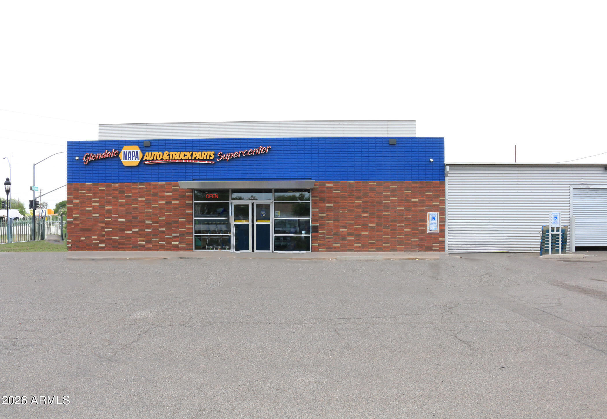 Strategically located on the high-visibility northeast corner of Grand Avenue and Myrtle Avenue, this property offers a rare combination of immediate stability and future upside. The 13,499 Sq. FT building is situated on a sprawling 1.1-acre (48,000 Sq. Ft) C-2 zoned lot and is currently 100% occupied under a NNN lease structure, ensuring consistent cash flow with minimal landlord responsibility.Beyond the current income stream, the property boasts approximately 12,000 SF of excess land, providing a prime footprint for future construction or site expansion. Benefiting from heavy traffic counts in the heart of Glendale's commercial corridor, the site features excellent ingress/egress, 30 uncovered parking spaces, and a well-maintained structure.