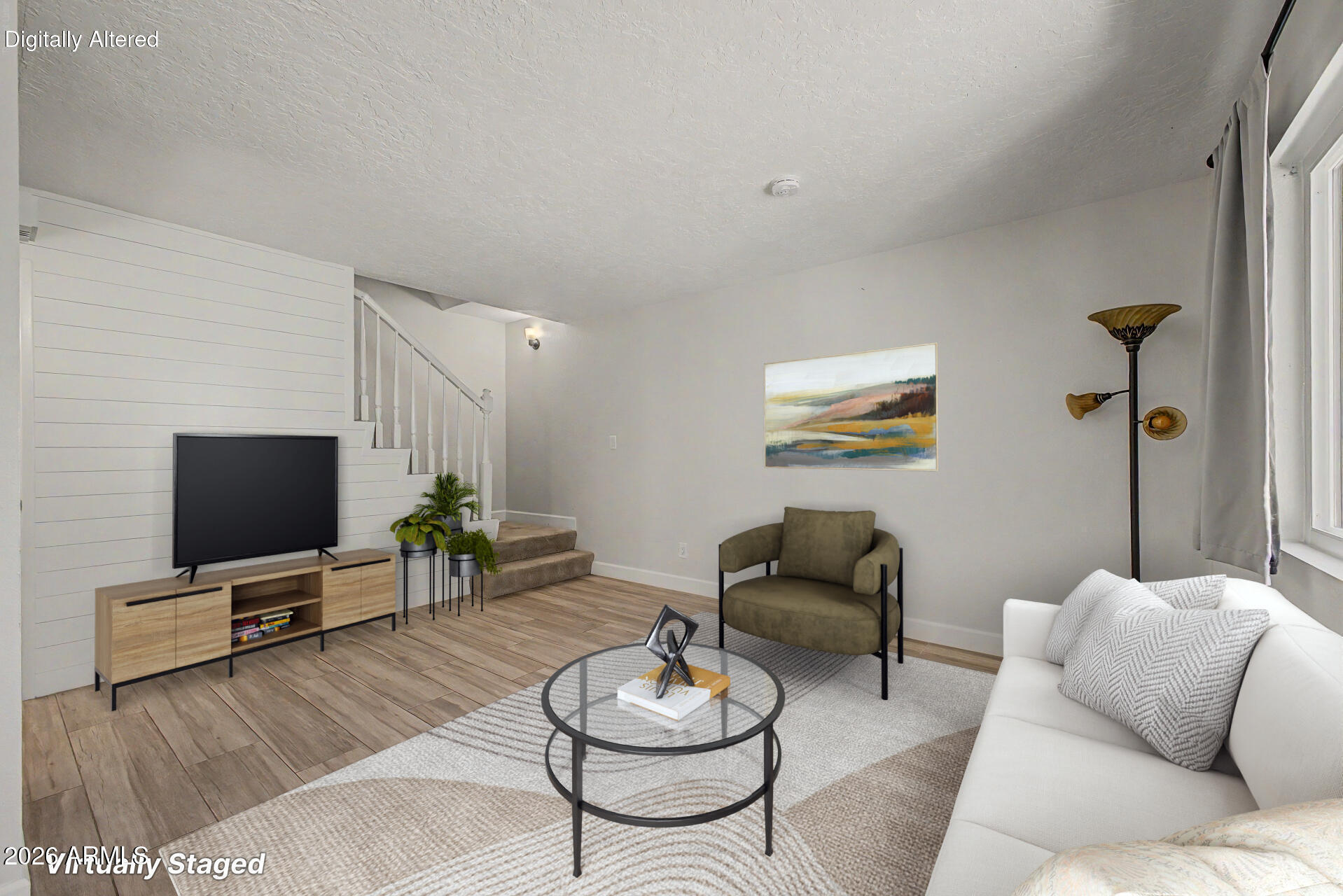 Move-in ready 2-bedroom, 1.5-bath condo offering 1,010 sq ft in a prime location near the Desert Botanical Garden, Phoenix Zoo, shopping, dining, entertainment, and more.
This light and bright home features updated flooring, kitchen, and bathrooms completed in 2022, along with new windows purchased in June 2025. The modern kitchen includes quartz countertops, stainless steel appliances, and ample cabinet space. Convenient half bath located downstairs, while both bedrooms are privately situated upstairs. Enjoy abundant natural light throughout the home and a private enclosed patio complete with pavers and artificial turf for easy outdoor living and added privacy. Community amenities include a pool and spa, making this home the perfect blend of comfort, style, style, and convenience.
