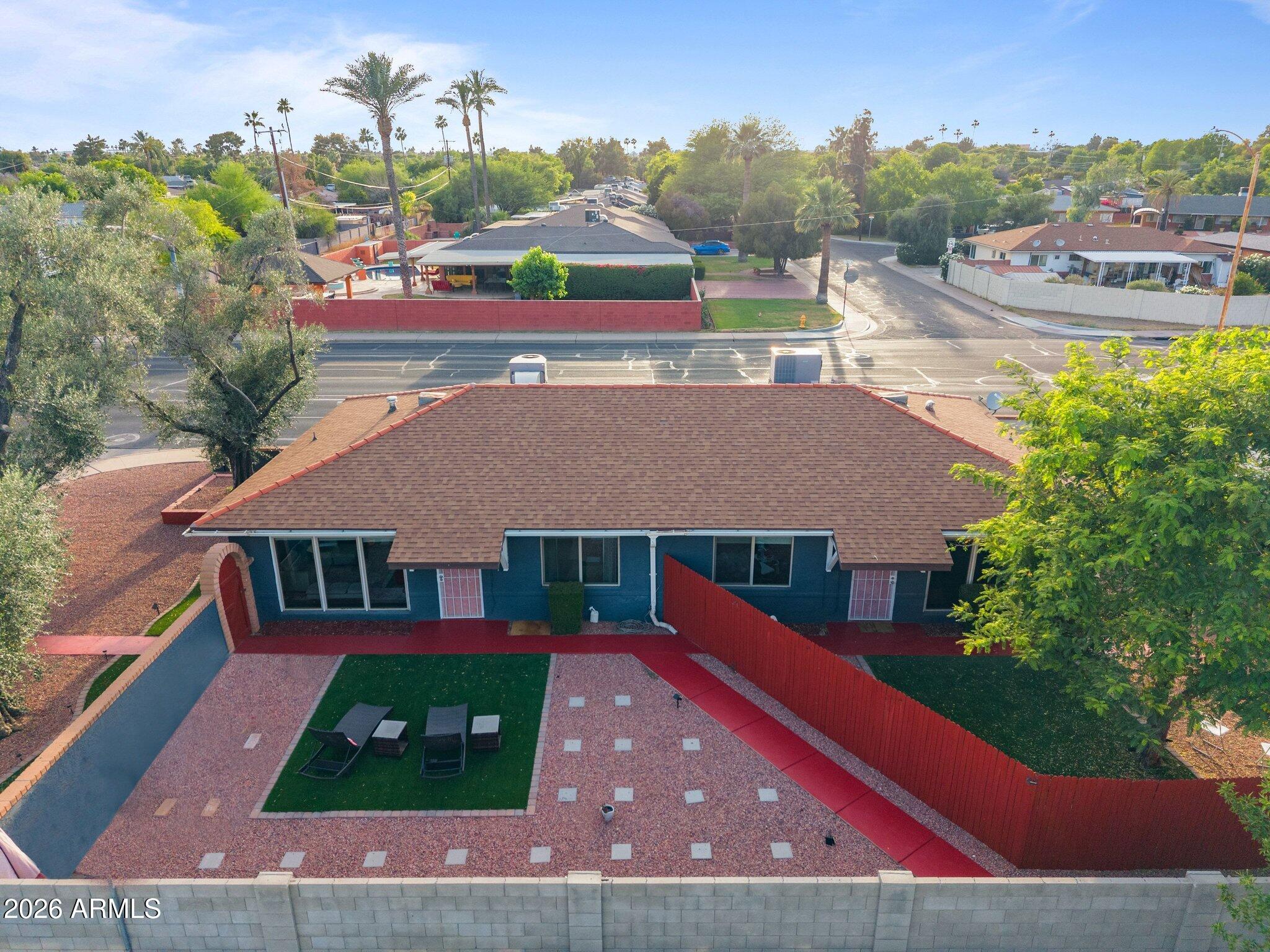 Rare opportunity to create a true multi-generational living compound in one of historic Central Phoenix's most desirable neighborhoods. 

Situated on an oversized lot and surrounded by the substantially higher-value homes of Rancho Solano & Solano Estates, 548 & 550 W San Juan Avenue offers two separate 2-bedroom / 1-bath residences, creating flexibility that is increasingly difficult to find. 

Whether accommodating extended family, providing independent living space for parents, adult children, caregivers or guests, the property offers a variety of living arrangements to fit today's evolving needs. For investors, the dual-residence configuration with no HOA restrictions presents multiple income opportunities including long-term rentals, furnished executive housing, short-term rentals The property's layout allows owners to enjoy one residence while generating revenue from the other.

Beyond the property itself, the location is a significant part of the appeal. Residents enjoy convenient access to some of Phoenix's most popular dining, shopping, and entertainment destinations, along with nearby parks, cultural attractions and major employment corridors. The combination of neighborhood character, urban convenience and continued investment has made this area one of Central Phoenix's most sought-after places to live and invest.

The expansive lot provides additional space for outdoor living, entertaining and future enhancements, while the surrounding neighborhood continues to benefit from strong demand and long-term appreciation potential.

Properties offering this level of flexibility, income potential and future optionality are increasingly rare. Whether your vision is a multi-generational retreat, income-producing asset or a combination of both, 548 & 550 W San Juan Avenue presents an exceptional opportunity in a premier Central Phoenix location.