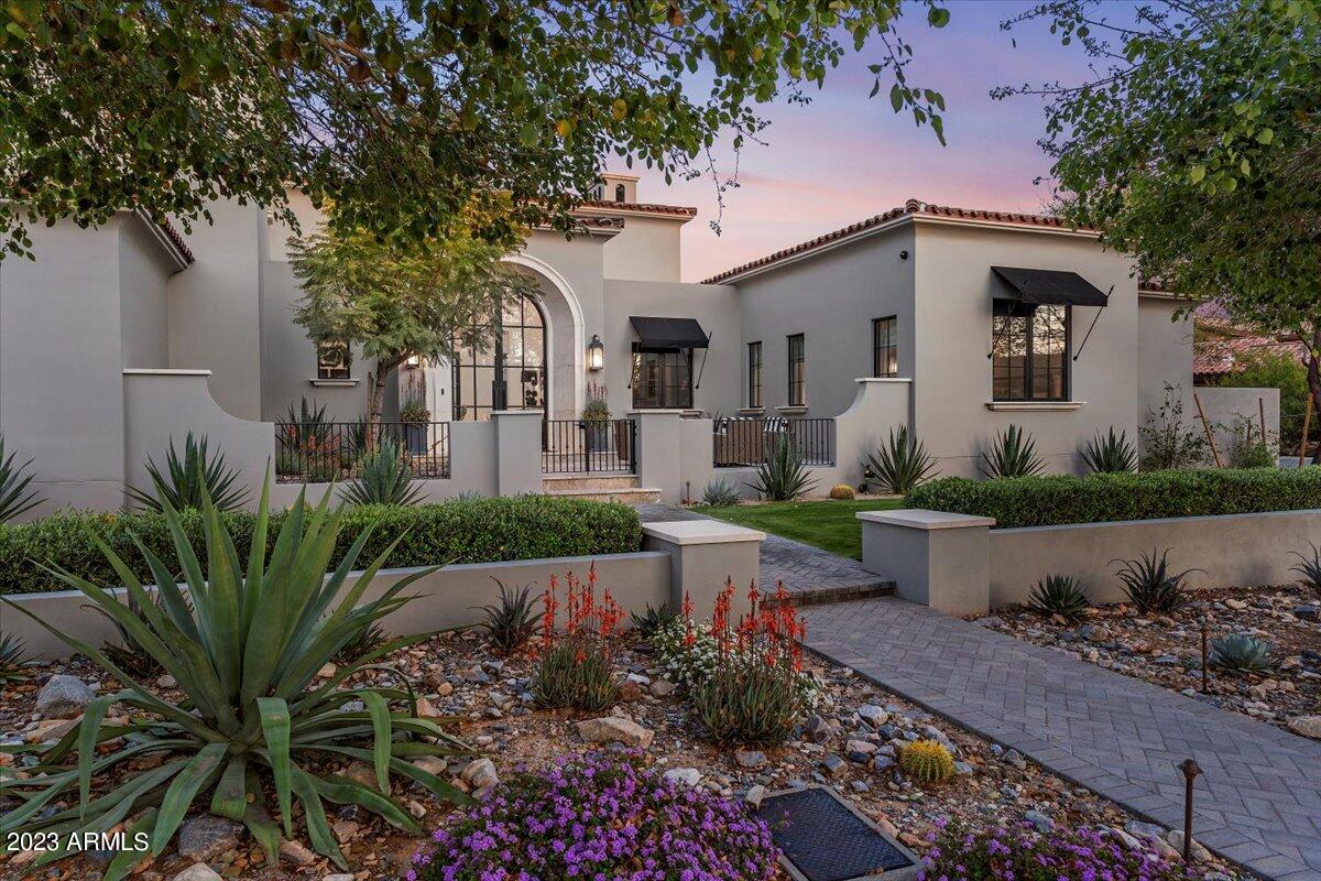 Settled amongst the pristine privacy of the McDowell Sonoran Preserve in the prestigious guard-gated Arcadia at Silverleaf enclave, this exquisite formal Mediterranean custom design + build offers personalized home-automated luxury living in the heart of North Scottsdale! Enjoy manned 24-hour guard-gated security, WiFi automated Control4 smart-home system, convenient access to hiking/walking paths, over 40 parks, Silverleaf spa & renowned private Silverleaf 18-hole championship golf course. The expansive open floor plan is enhanced with coffered ceilings, oak wood flooring, elegant chandeliers, blackout shades, 3 ambient fireplaces, custom built-ins & surround sound throughout. Top of the line gourmet kitchen is equipped with Carrara marble countertops, white shaker cabinets, a warming -- drawer, Wolf 8-burner gas range, an oversized center island, dual refrigerators/dishwashers, spacious walk-in pantry with a library ladder & an entertainer's wet bar with 2 SubZero wine refrigerators & nugget ice machine. Retreat to any of the 5 ensuite bedrooms with walk-in closets, the executive office, in-law suite with private kitchenette or the secluded primary suite boasting elegant marble finishes, antique nickel sconces, motorized blackout shades, Carrara tiled steam shower, soaking tub, dual water closets & custom walk-in closet. Head upstairs to the 2 guest en-suites & flex space with a private view balcony. The manicured resort-style grounds present expansive front + back lounge patios, outdoor 65" TV entertainment, sparkling geothermal heated pool + spa, personal sports court, pickle ball, 2 fire pits, low maintenance astro turf, gated dog run, space heaters & more! We welcome your inquiries!