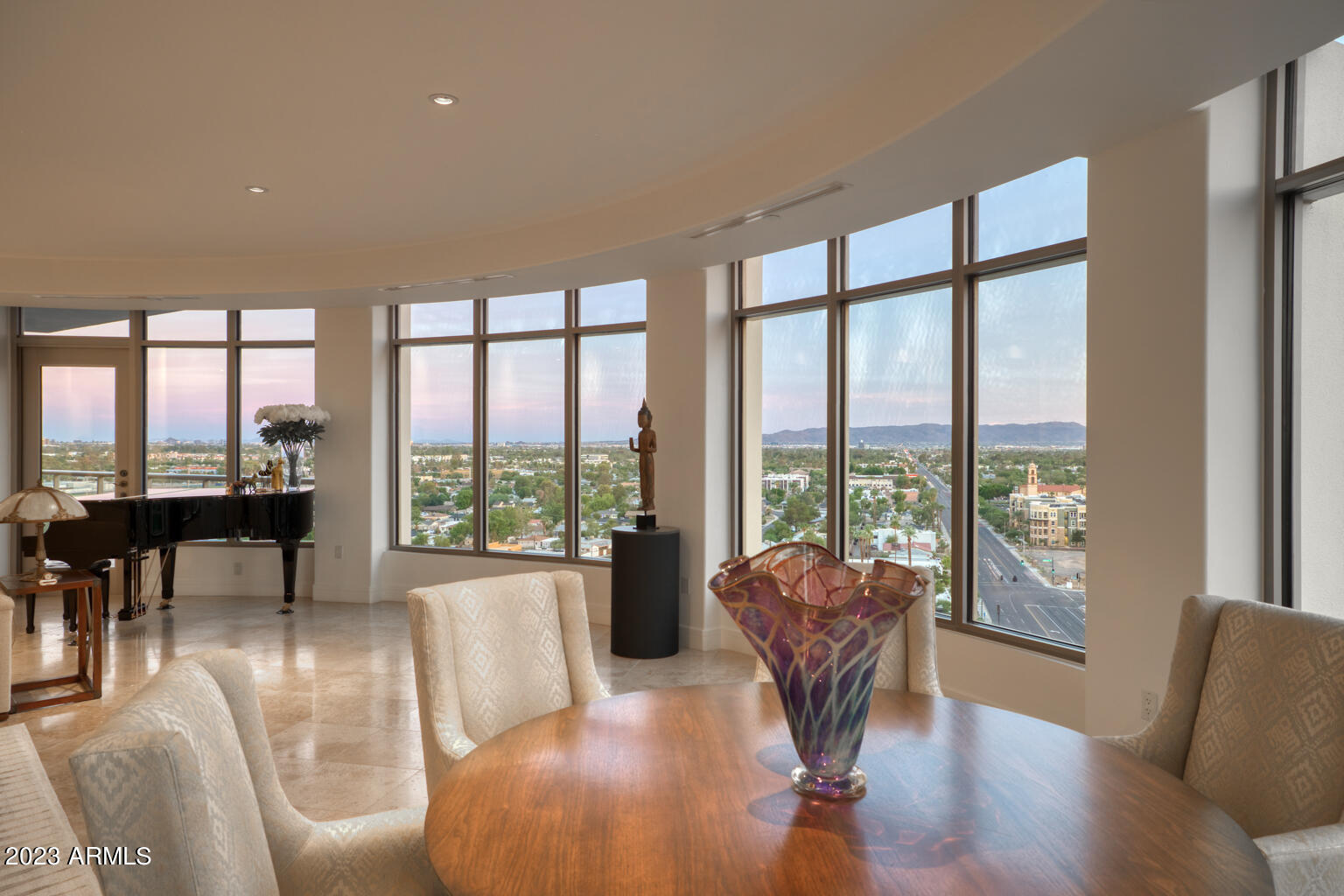 Discover this  rare opportunity to own the largest and  beautifully appointed penthouse on the top floor of award-winning Esplanade Place, Phoenix's premiere luxury high-rise. This residence has breathtaking, unobstructed panoramic city, mountain and sunset views! With 4,286sf, this pristine and classic residence has travertine stone and wood floors and is richly finished throughout. The grand great room, gourmet chef's kitchen, large wine storage, media room, 2 primary suites, are a few of the highlights. Three garage spaces and a large storage room are included. Enjoy the finest services and amenities including full fitness center, rooftop pool, spa, firepit and seating, valet parking, 24hr lobby desk staff at 24th Street & Camelback Rd., in the iconic Biltmore and Camelback Corridor.