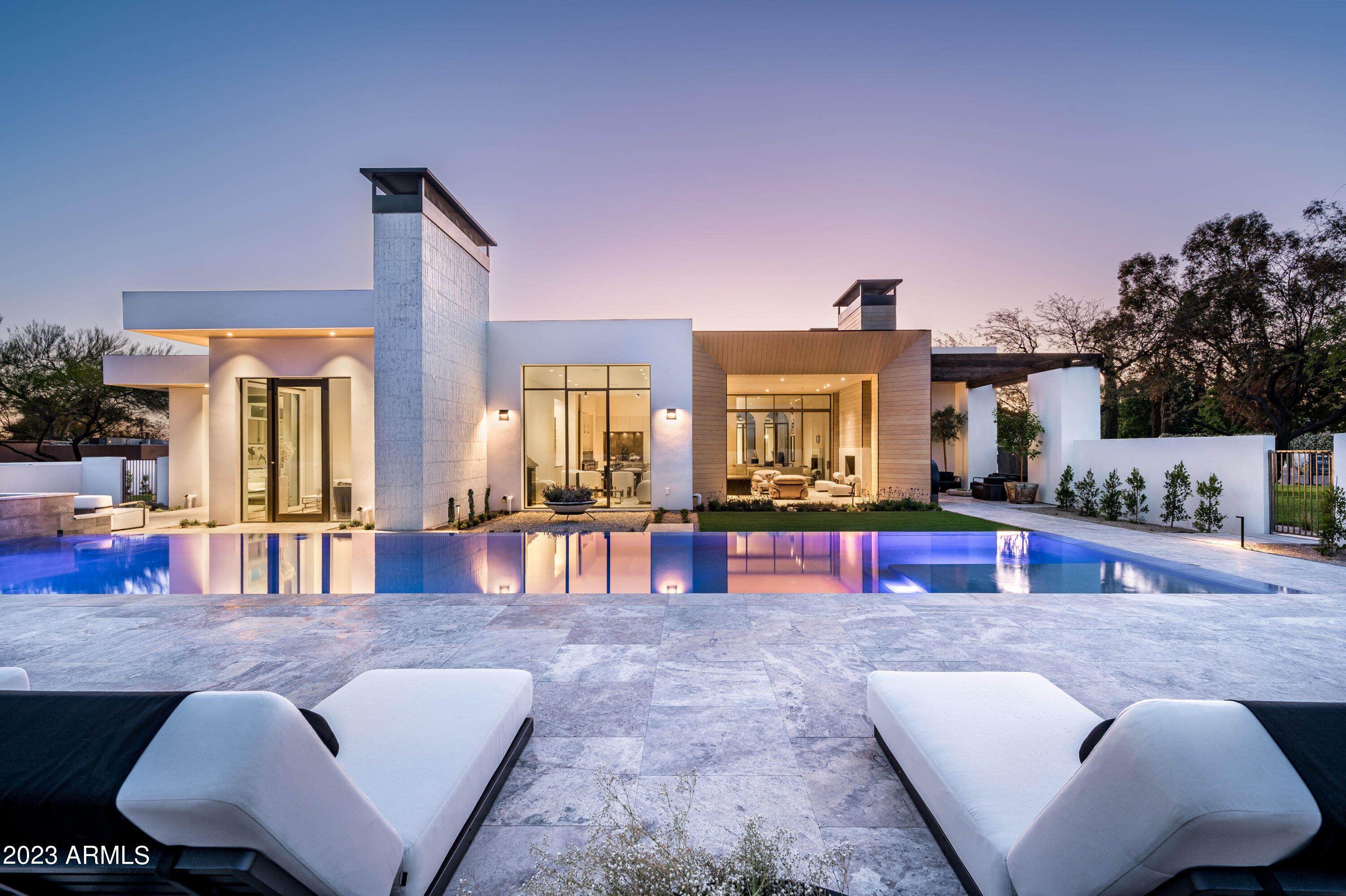 Welcome to Camino Estate, an extraordinary luxury experience in refined desert living. This elegantly scaled modern masterpiece is the first Arizona project of world renowned designer, Windsor Smith, and built to the absolute highest standard by Regal Homes. The garden vision of Berghoff  Landscaping provides a lush counterpoint to this sophisticated architectural gem in the heart of Paradise Valley. Views of Camelback Mountain and Praying Monk add to the incredible ambience of this spiritual oasis. Windsor Smith's work and luxury lifestyle philosophies are regularly featured in Forbes, Architectural Digest, Elle Décor, New York Times, WSJ, Vogue and many more. Her clientele are global power hitters and celebrities alike.