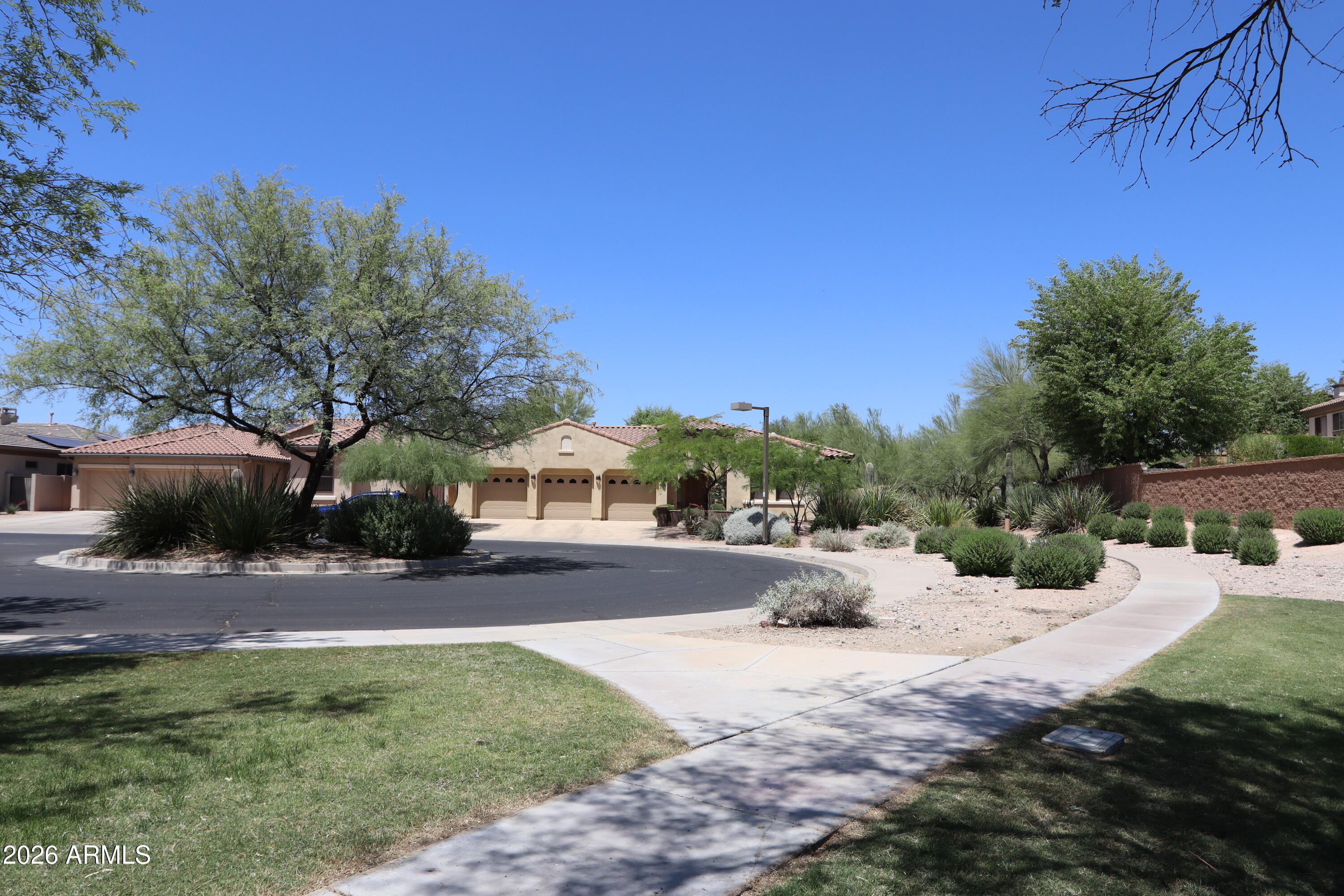 Beautiful house, with many upgrades throughout house and property.  This luxury Toll Brother's Savino model has an interior courtyard, back yard waterfall, and newly remodeled kitchen.  The home has two gas fireplaces, tile & carpeted floors, freshly painted interior, and 4 zone climate control.  Inquire for more details and to show the home.
