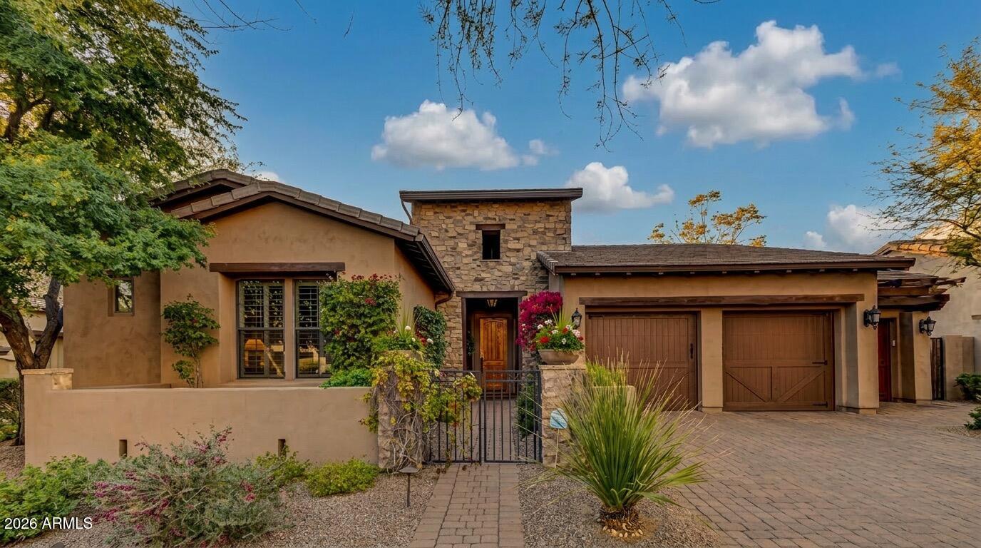 Stunning remodeled executive home behind the gates of DC Ranch! This single-level ranch-style residence sits on a massive .28 acre lot, with no steps throughout, offering a seamless flow hard to find!

You'll be captivated by the remarkable interior featuring beamed ceilings, a formal dining room open to the great room, and numerous high-end upgrades. The gorgeous chef's kitchen is a dream for any culinary enthusiast! This home offers incredible flexibility with a primary suite featuring two custom walk-in closets, plus all bedrooms are en-suite, and there are two additional bonus rooms. 

Venture outside into your own backyard paradise! This magnificent setting features lush natural grass and a refreshing pool. Surrounded by mature trees for ultimate privacy, it's the perfect space for entertaining or quiet relaxation. Plus, the three-car garage provides tons of storage for all your gear.

Enjoy the best of Scottsdale living with community parks, trails, tennis, pickleball, and golf all nearby! You're just minutes away from top-rated schools, fine dining, shopping, and world-class hiking.

What more could you ask for? This offer won't last long. Make it yours today!