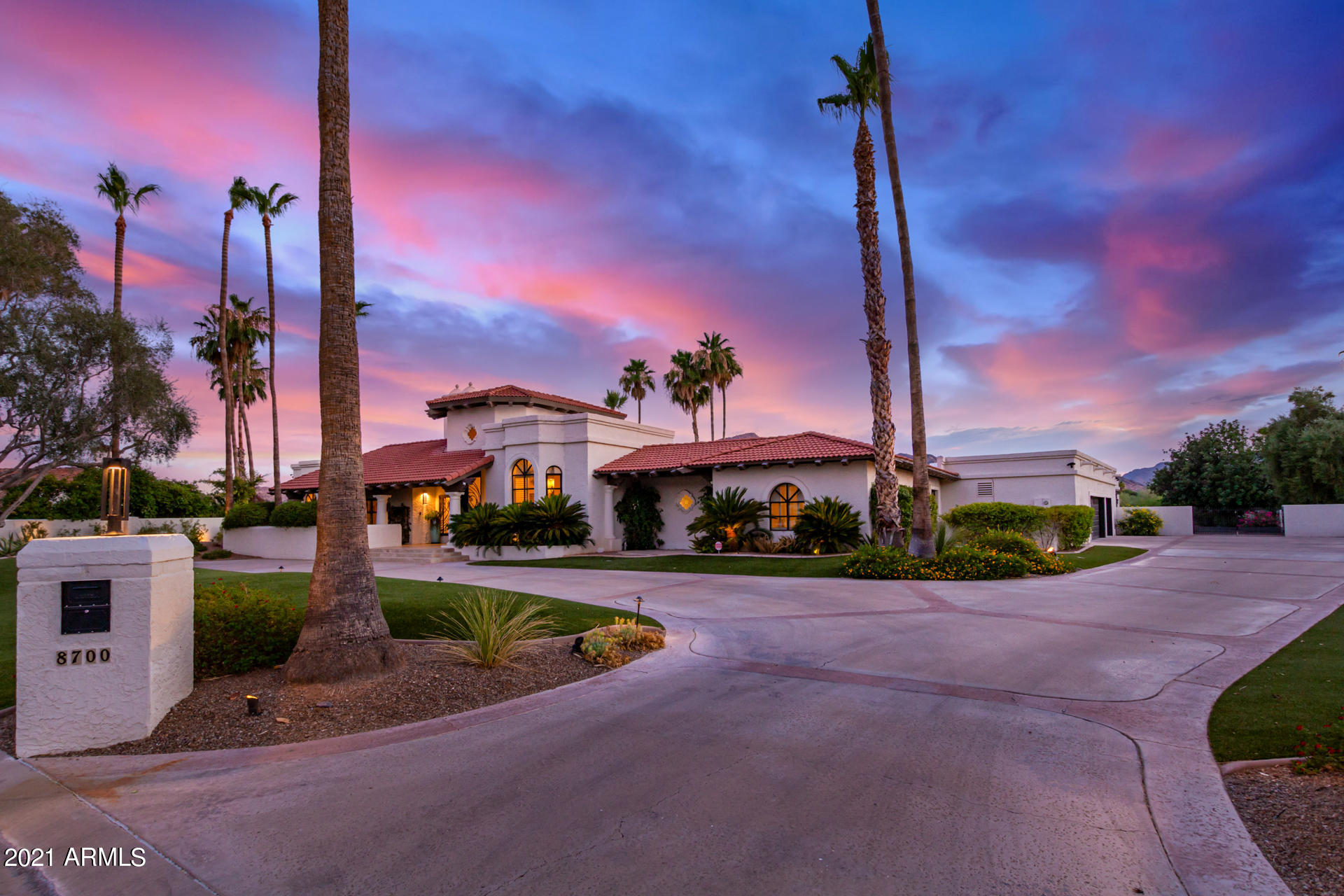 One of a kind gorgeous home located on one of the most premium view lots in Paradise Valley. Offering stellar views showcasing Mummy Mountain & overlooking the 17th tee box on the Ambiente Course at Camelback Golf Club. This home is a rare tapestry of Santa Barbara Tuscan architecture, modern accents, and a prize winning location. You are transfixed as you enter this oasis through 2 massive custom wrought iron & glass doors. Chef's kitchen is equipped w/brand new 36x36 side by side SubZero refrigerator, Wolfe dual ovens & gas range, and quartz countertops. Separate master wing w/sitting room, romantic fireplace, 2 walk-in closets, ensuite w/free standing tub & shower. 3 Guest suites each w/ensuite, & walk-in closets. Newly permitted 730 SqFt professional gym. Come experience this gem! sidelights, 2nd majestic wrought iron & glass door framing Mummy Mountain, vaulted ceilings, 500 capacity wine room, 3 interior & 1 exterior fireplace, extra wide hallways, wet bar & refrigerator, new extensive audio installed, ample storage, newly added permitted bonus room, fully insulated foam ceilings and walls, A/C, & central vac. Outdoor living, sparkling salt water pool, water feature, fire-pit, & built-in BBQ. Oversized 3 car garage w/4 walk-in storage closets. Security w/roller shields, monitored by Unique Security-all doors & windows, & 9 cameras. Recirculation pump. Low yard maintenance w/artificial grass, room for possible sport court, & putting green. Make this gem yours today!