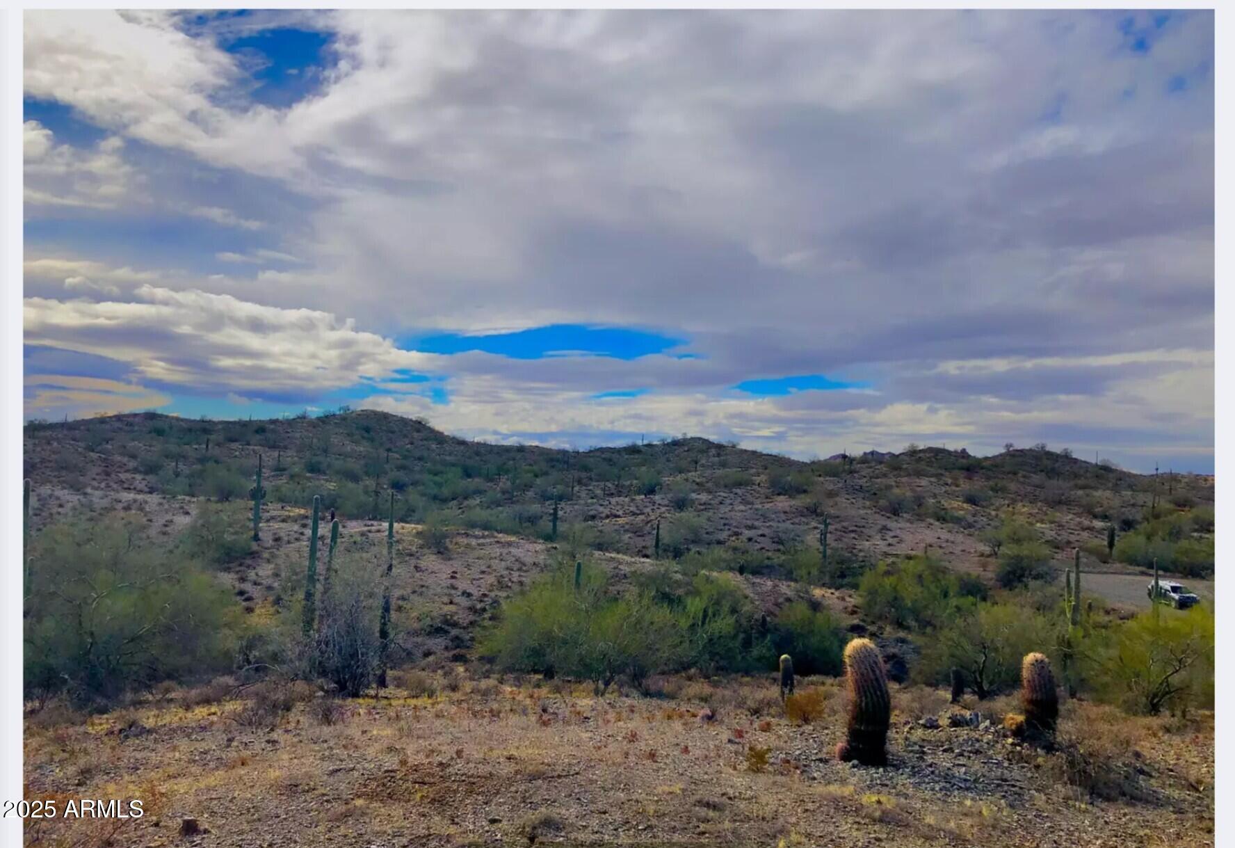 Dream big on 3.74 acres in the desirable San Tan Ranches community. Enjoy peace, privacy, and panoramic views of the San Tan Mountains from this elevated Queen Creek location. The property offers the perfect canvas for your custom home or manufactured retreat, with power available at the lot line and easy access via well-maintained roads. No HOA—bring your plans and build your vision. Experience wide-open desert living, incredible sunsets, and the potential to invest in one of the Valley's fastest-growing areas.