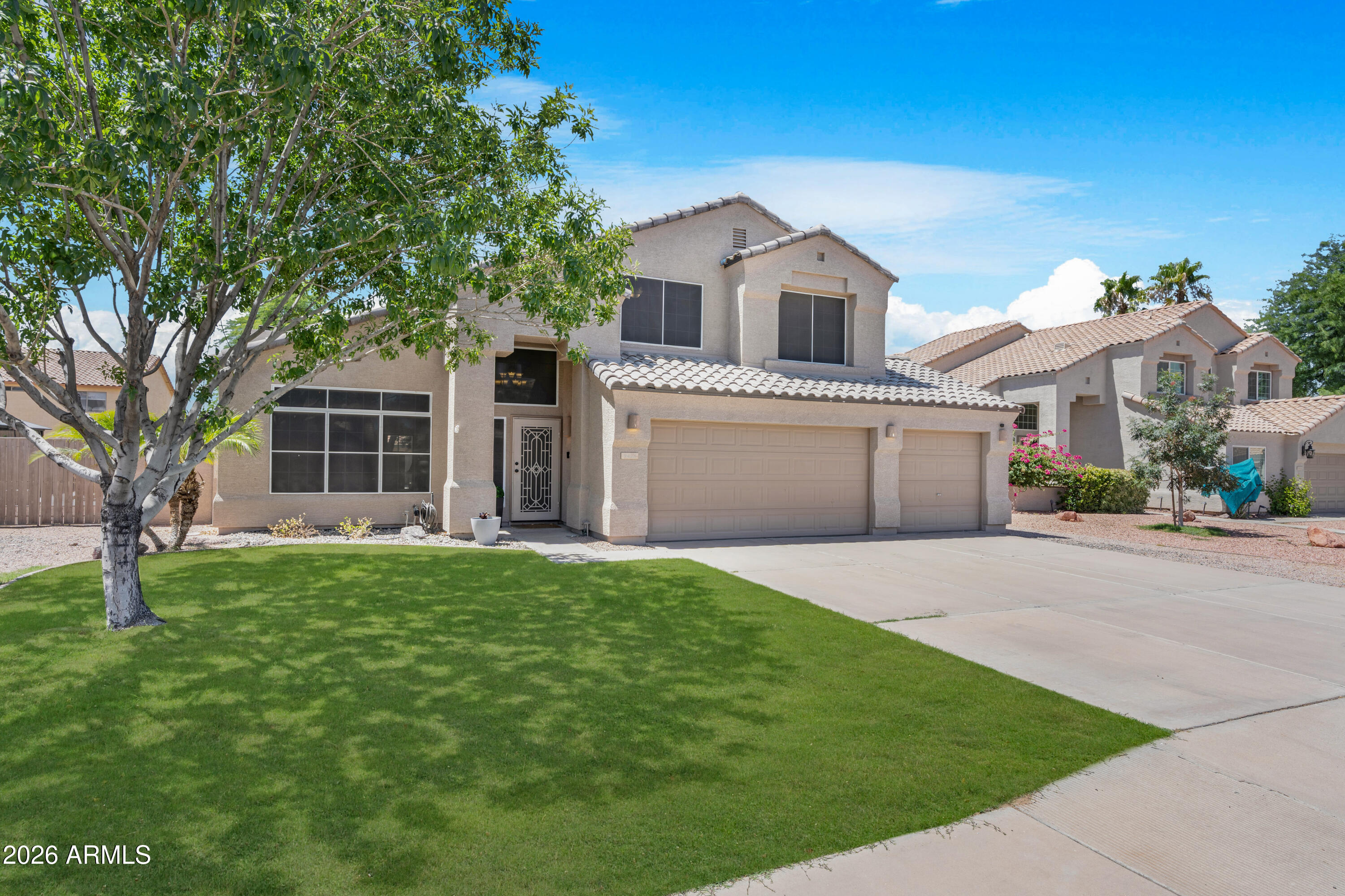 This stunning move-in ready, resort-style pool home positioned in the highly sought-after Sierra Ranch community in Mesa. This 4-bedroom, 2.5-bath, 2-story gem delivers the ultimate Arizona indoor-outdoor lifestyle at an unbeatable value. The heart of the home is a chef-inspired kitchen featuring granite countertops with a breakfast bar peninsula. Soaring vaulted ceilings with rich wood laminate flooring  create a warm, open atmosphere throughout.Seller is offering $5,000 toward buyer's closing costs with an acceptable offer. Additional Peace of Mind highlights include a newer roof, paid-off solar, a new pool, updated AC, and a turnkey interior. RV gate and ample space for RV, off road toys, or an addtional structure.