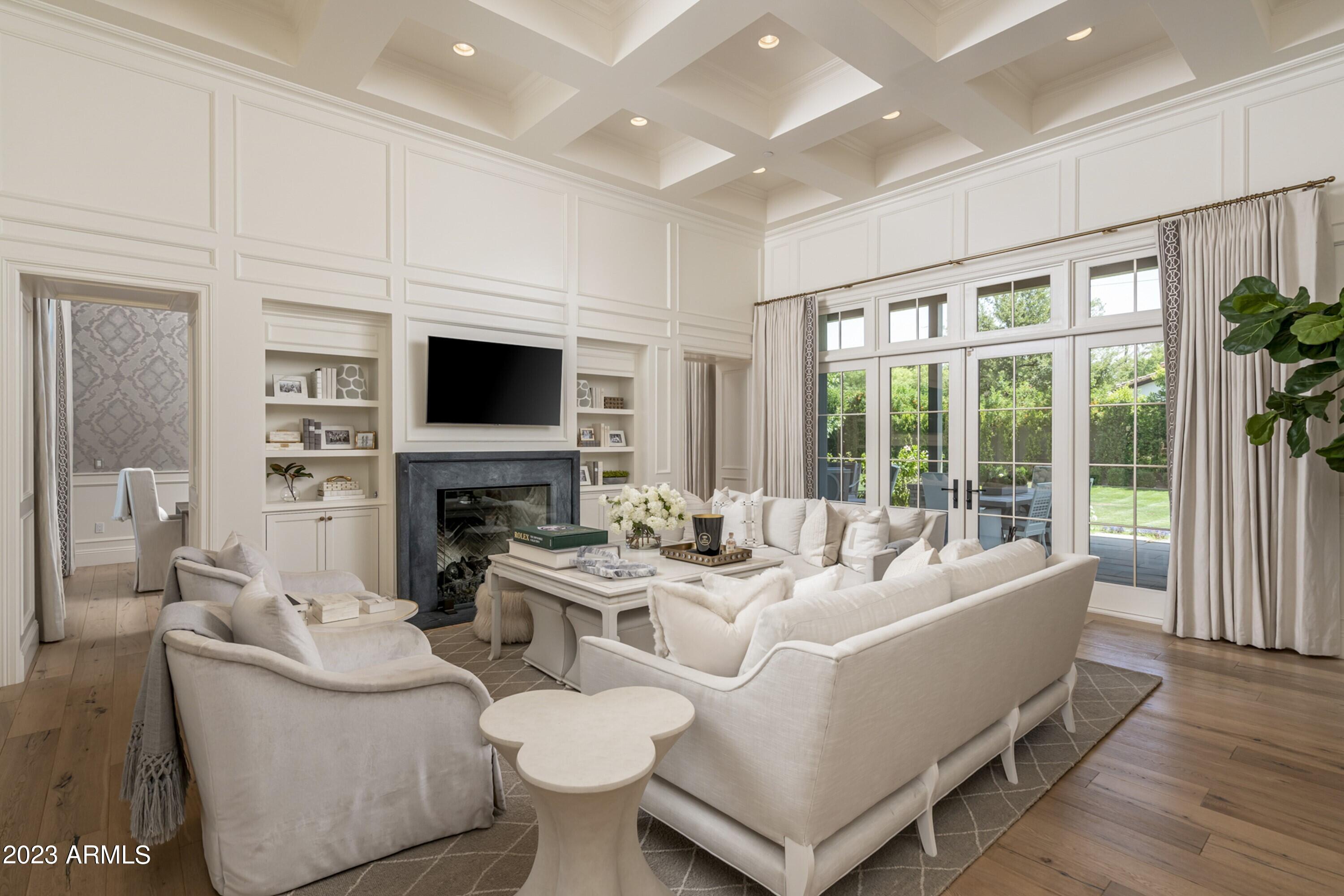 Ideally located, with beautiful views of Camelback Mountain, this gorgeous home, crafted and designed with impeccable attention to detail and quality, exemplifies exceptional taste, elegance, and refined luxury living.  The home is located in the prestigious community of Arcadia, just minutes from Old Town Scottsdale, Fashion Square Mall, and the area's finest restaurants, shopping, boutiques, spas, and health clubs.  In addition, the Phoenix International and Scottsdale Airports are just 15 and 22 minutes away, respectively.  This home must be viewed and experienced in person to be truly appreciated.